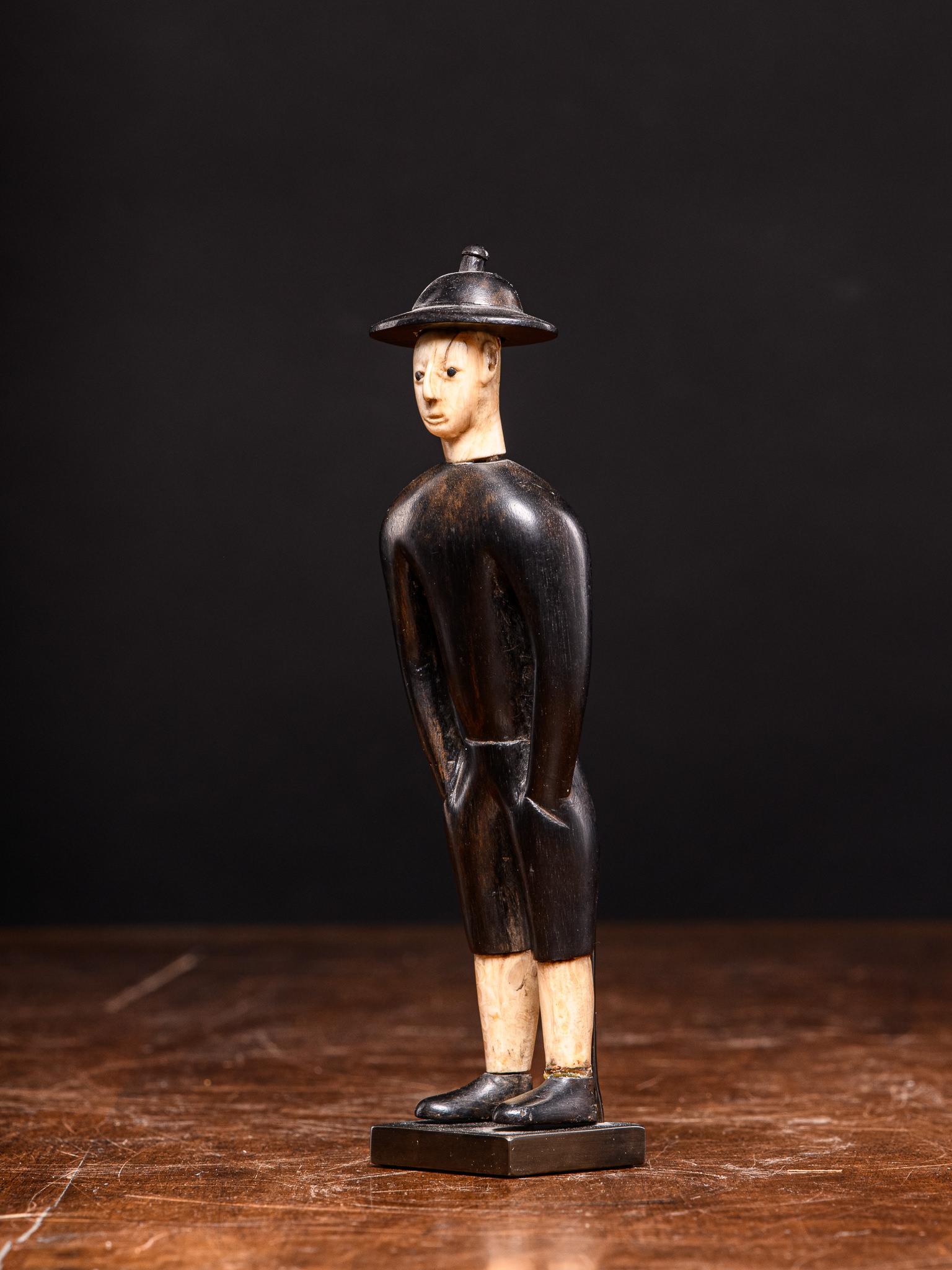 20th Century Kongo Wooden statue depicting Chinese worker waring typical hat, DRC For Sale