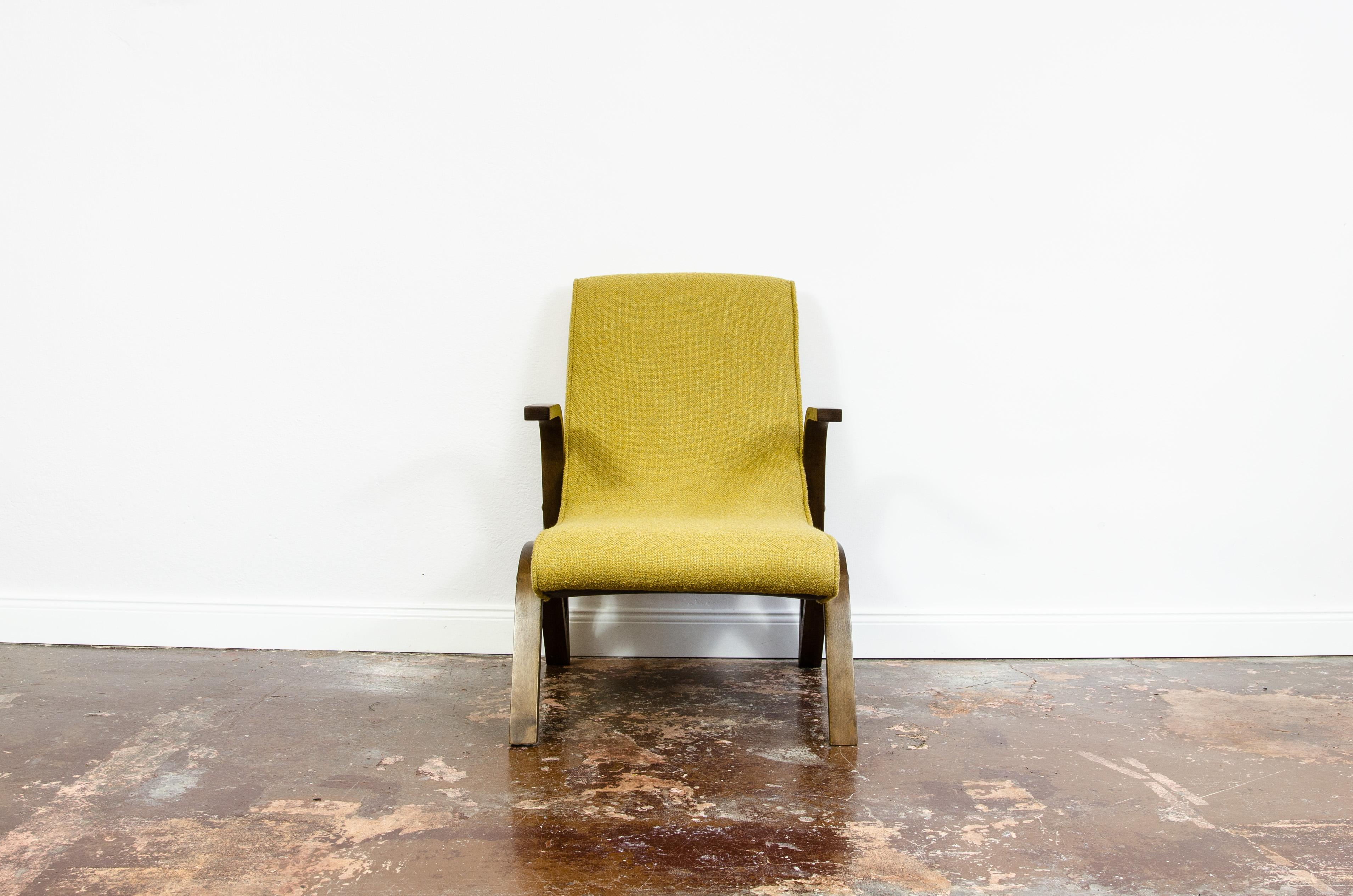 Yellow Konkav armchair by Paul Bode for Deutsche Federholzgesellschaft, 1950s Germany.

