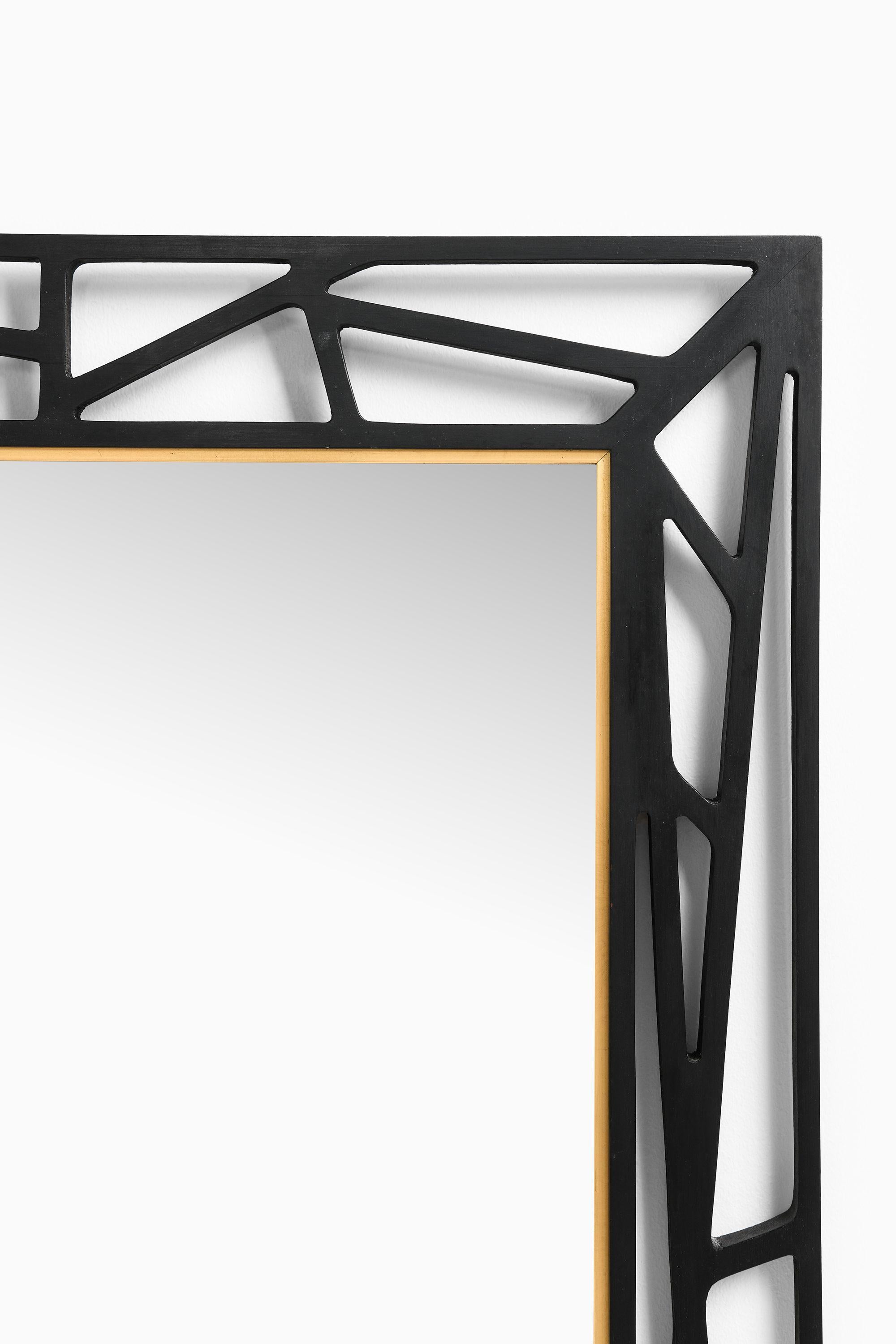 Scandinavian Modern Konkret Mirror in Black Lacquered Wood Attributed to Yngve Ekström, 1950's For Sale