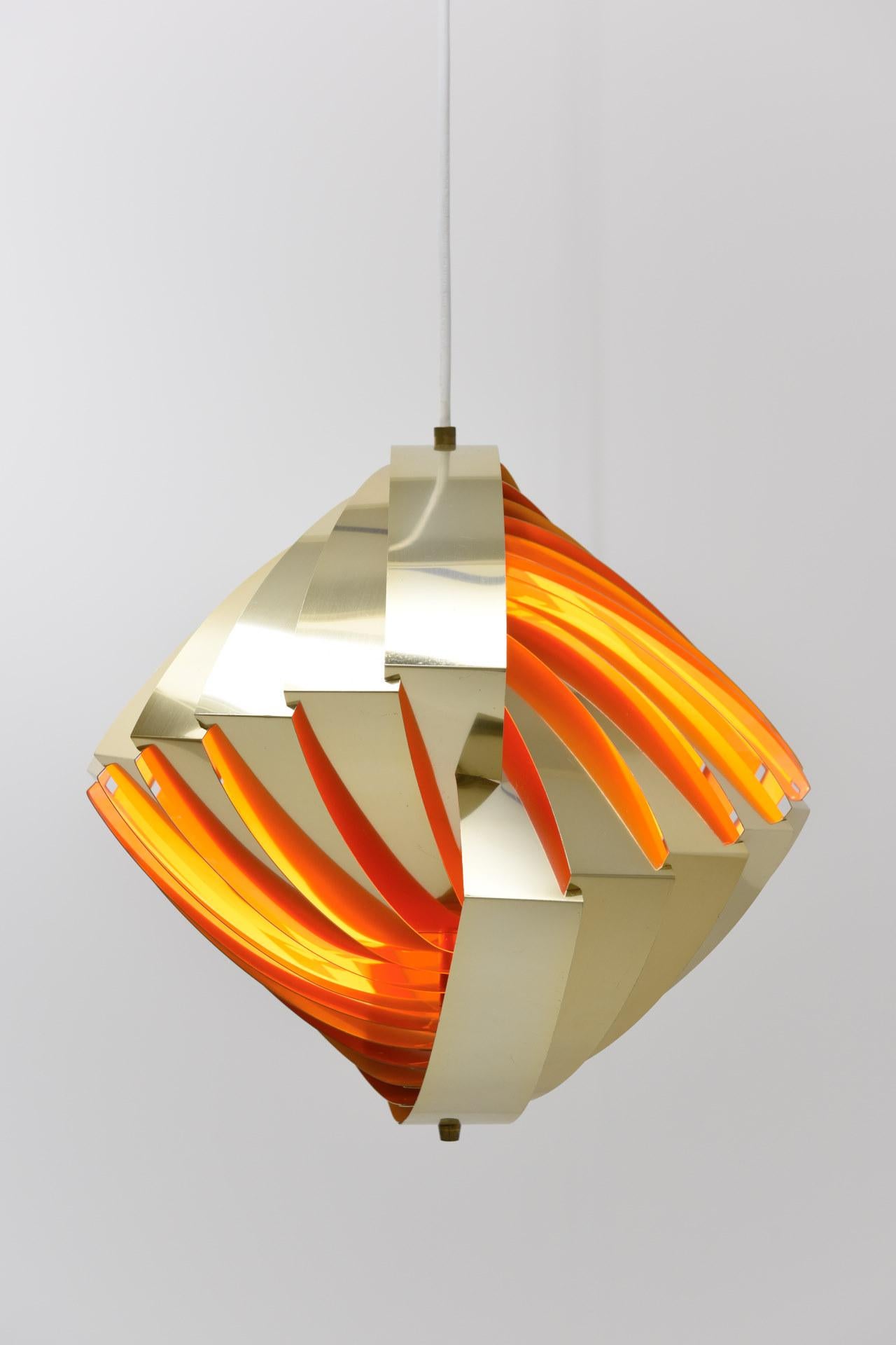 'Konkylie', or 'Conch Shell' ceiling lamp was made for the Tivoli Garden in Copenhagen in 1964. Designed by Louis Weisdorf and manufactured by Lyfa. The brass lamellas reflect the light and cover the lightbulb from any angle. The warm light is
