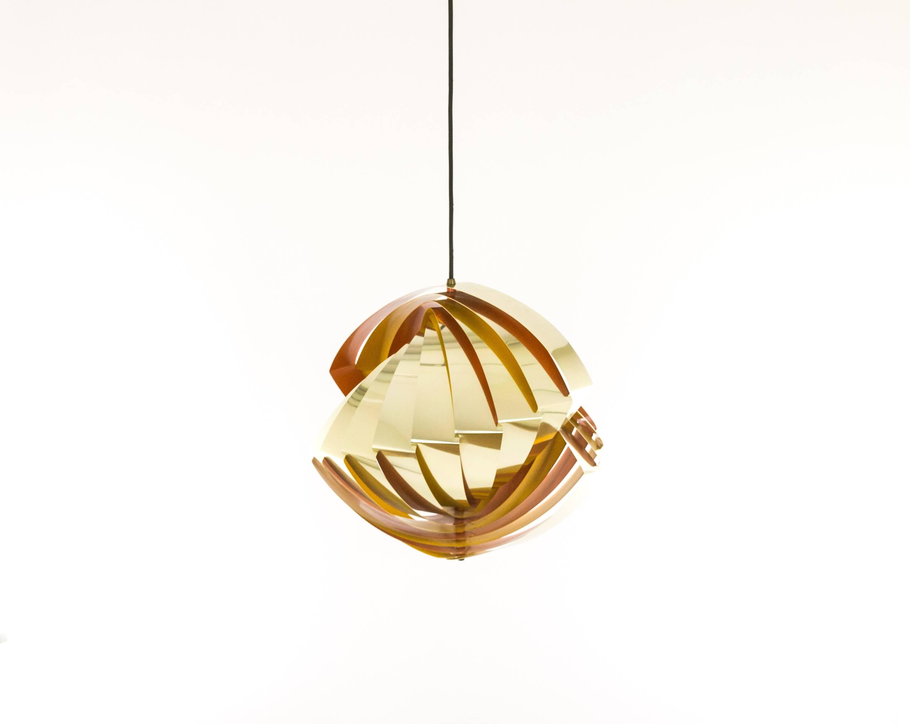 Louis Weisdorf, the renowned Danish architect and designer, created this Konkylie in pendant in 1963. It was produced by lighting manufacturer Lyfa as from 1964.

Konkylie consists of 12 thin metal slats that, elegantly bent, form a conch-like