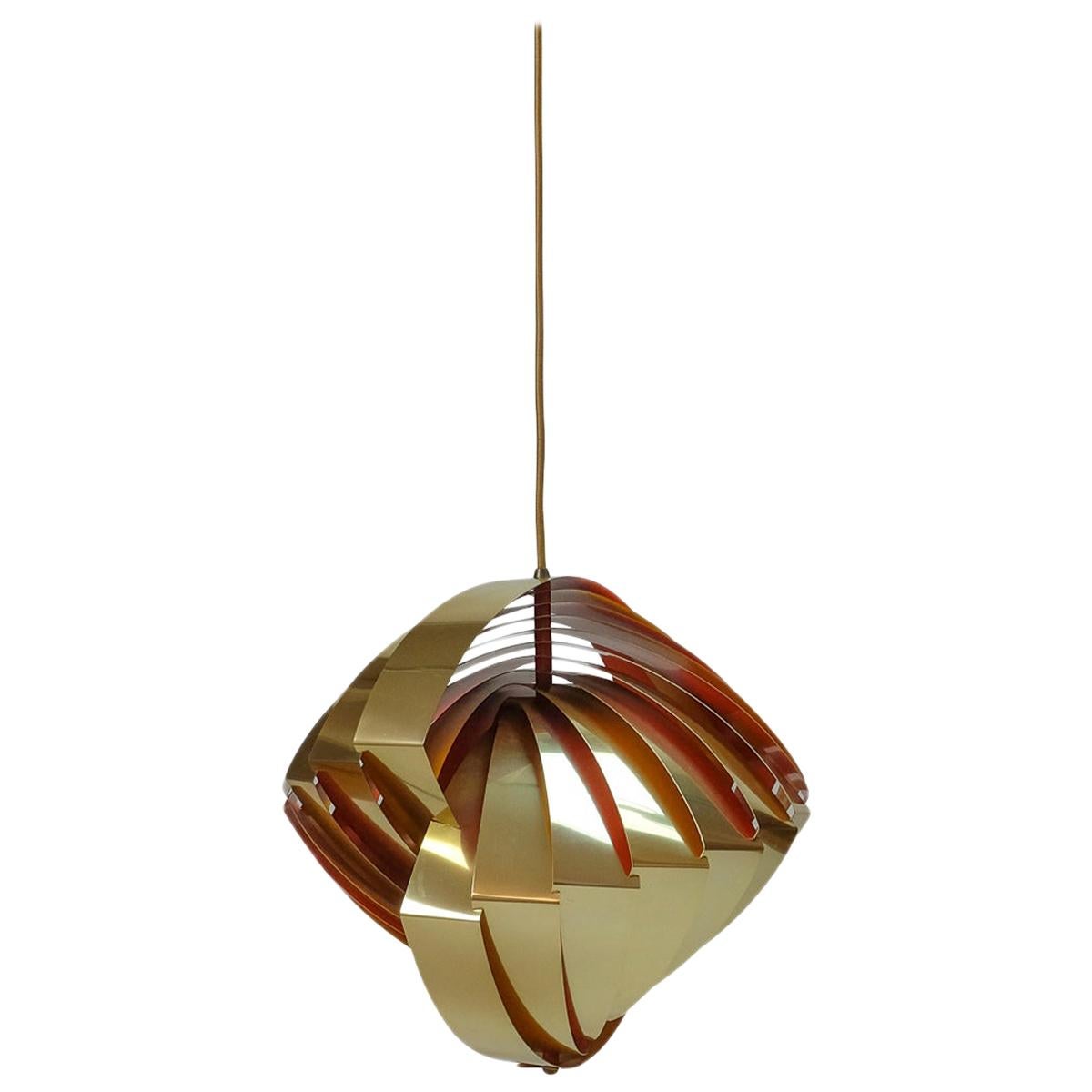 The Konkylie ceiling lamp was designed by Louis Weisdorf and produced by Lyfa in Denmark during the 1960s.

The gold-colored blades have an orange interior, which produces a warm glow. They are installed in such a way that you never look directly