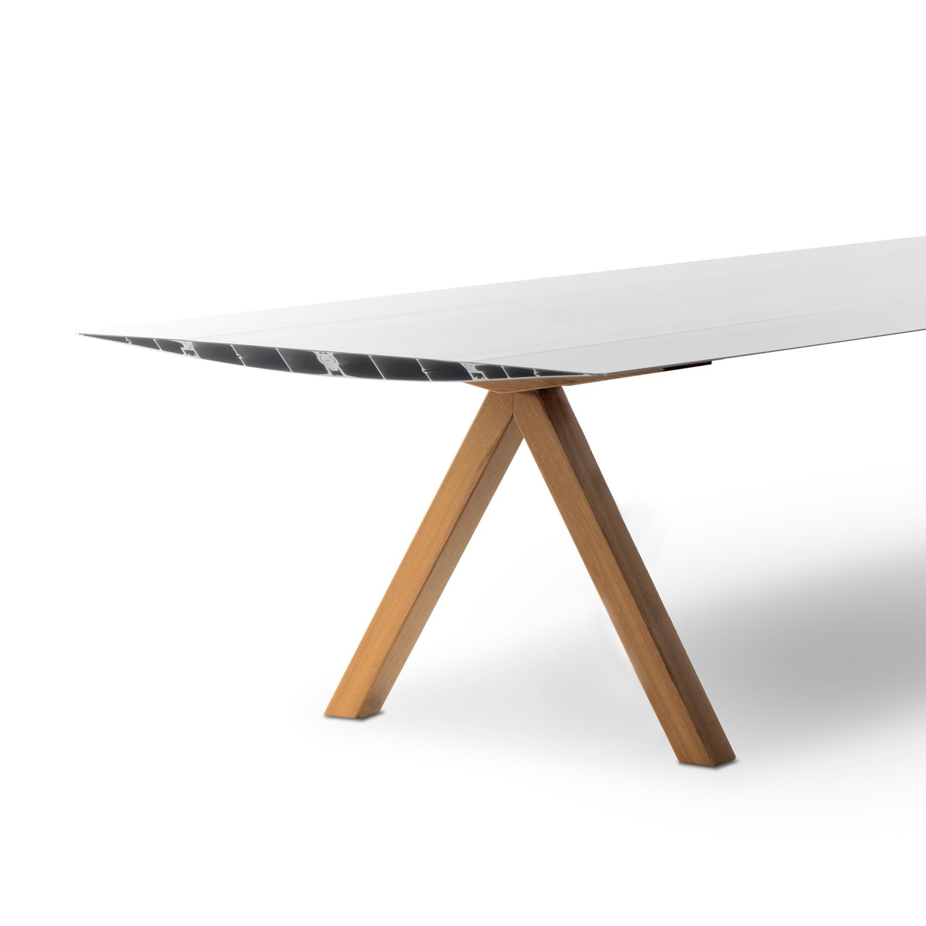 Table designed by Konstantin Grcic designed in 2009 manufactured by BD Barcelona.

The Table B, which inaugurated the Extrusions Collection in 2009, can reach up to five metres using a simple profile of extruded aluminium. Its apparent simplicity