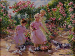 Drei junge Mädchen in einem Rosengarten