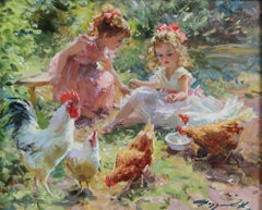 Two young girls feeding chickens