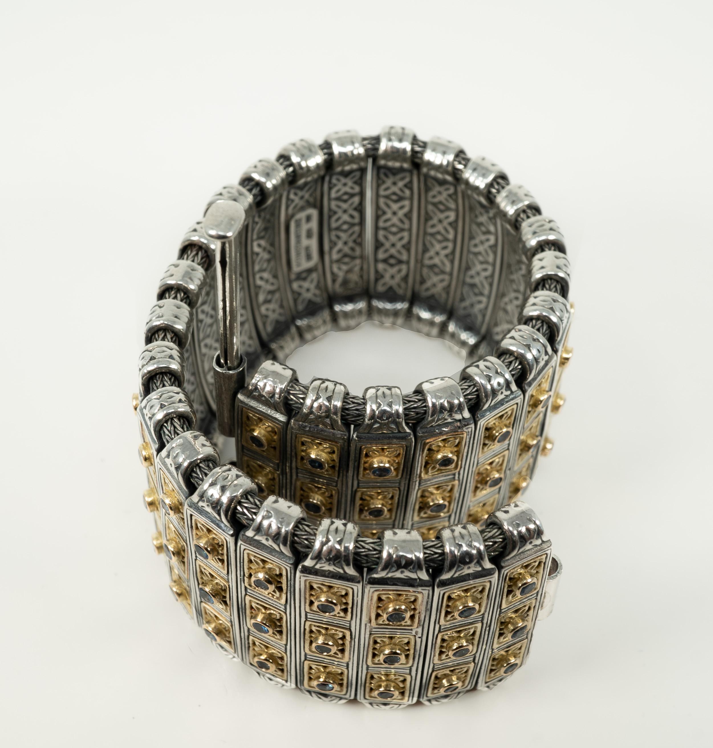 In sterling silver and 18 karat yellow gold, with sparkling blue stones, this classic Konstantino bracelet is lovely!

Please note length is approximate.