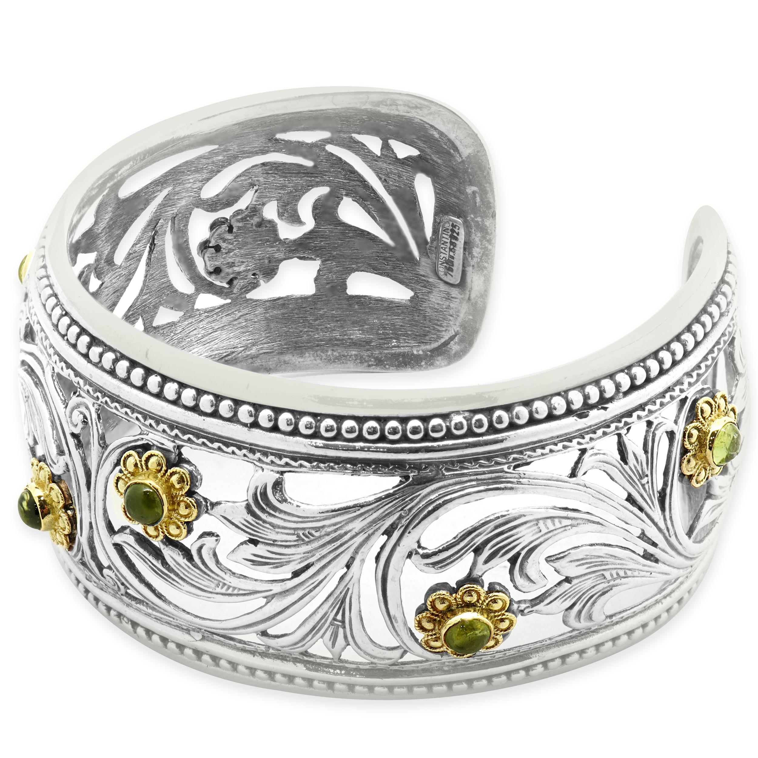 Designer: Konstantino
Material: 18K yellow gold & Sterling Silver
Peridot: cabochon cut = 0.68cttw
Dimensions: bracelet would fit approximately a 6.5-inch wrist
Weight: 56.60 grams
