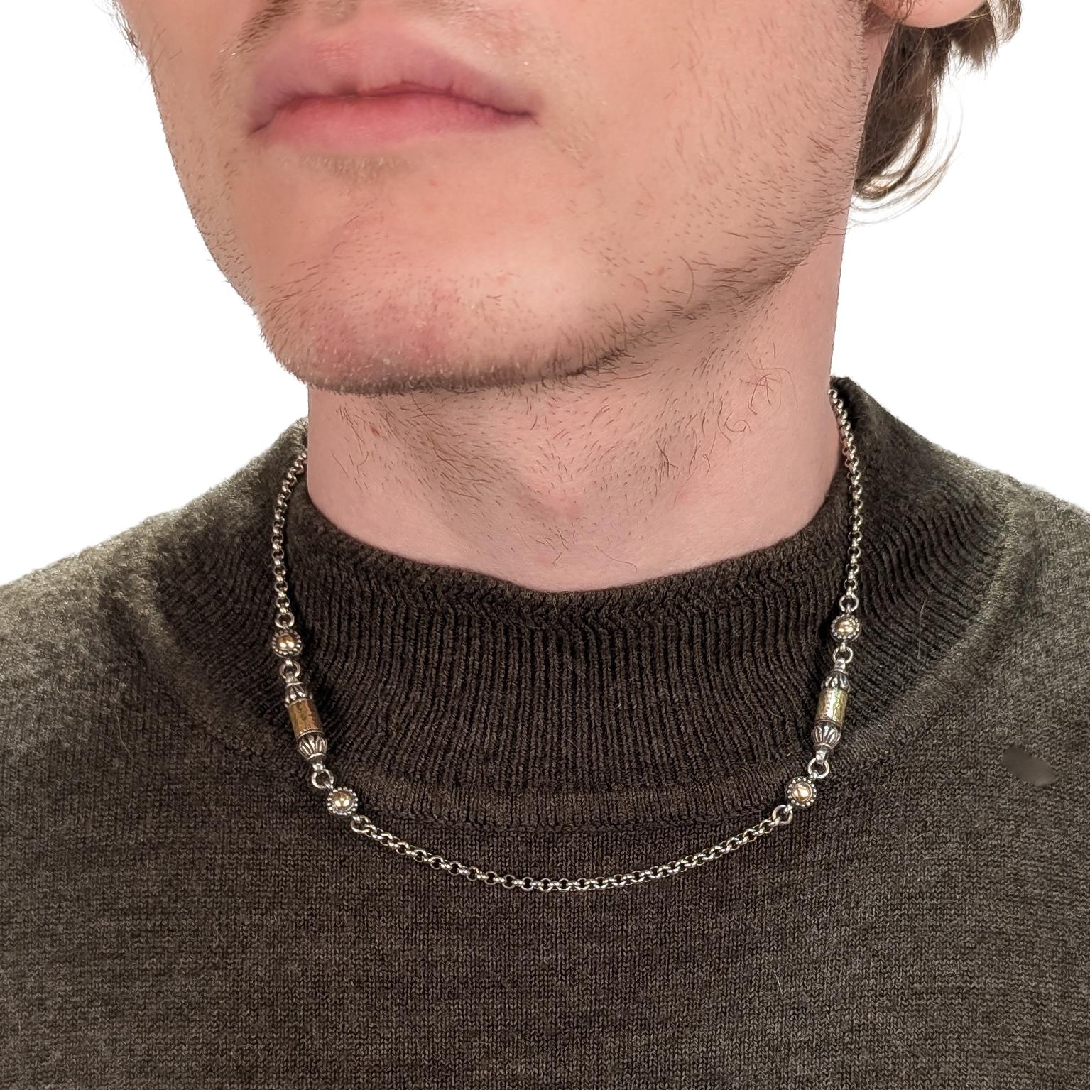 A fine, signed mixed metals bullet station necklace.

By Konstantino.

From the Aspasia series.

With two bullet shaped station beads with gold accents.

Secured with a toggle closure.

Marked to the clasp.

Simply a wonderful Konstantino
