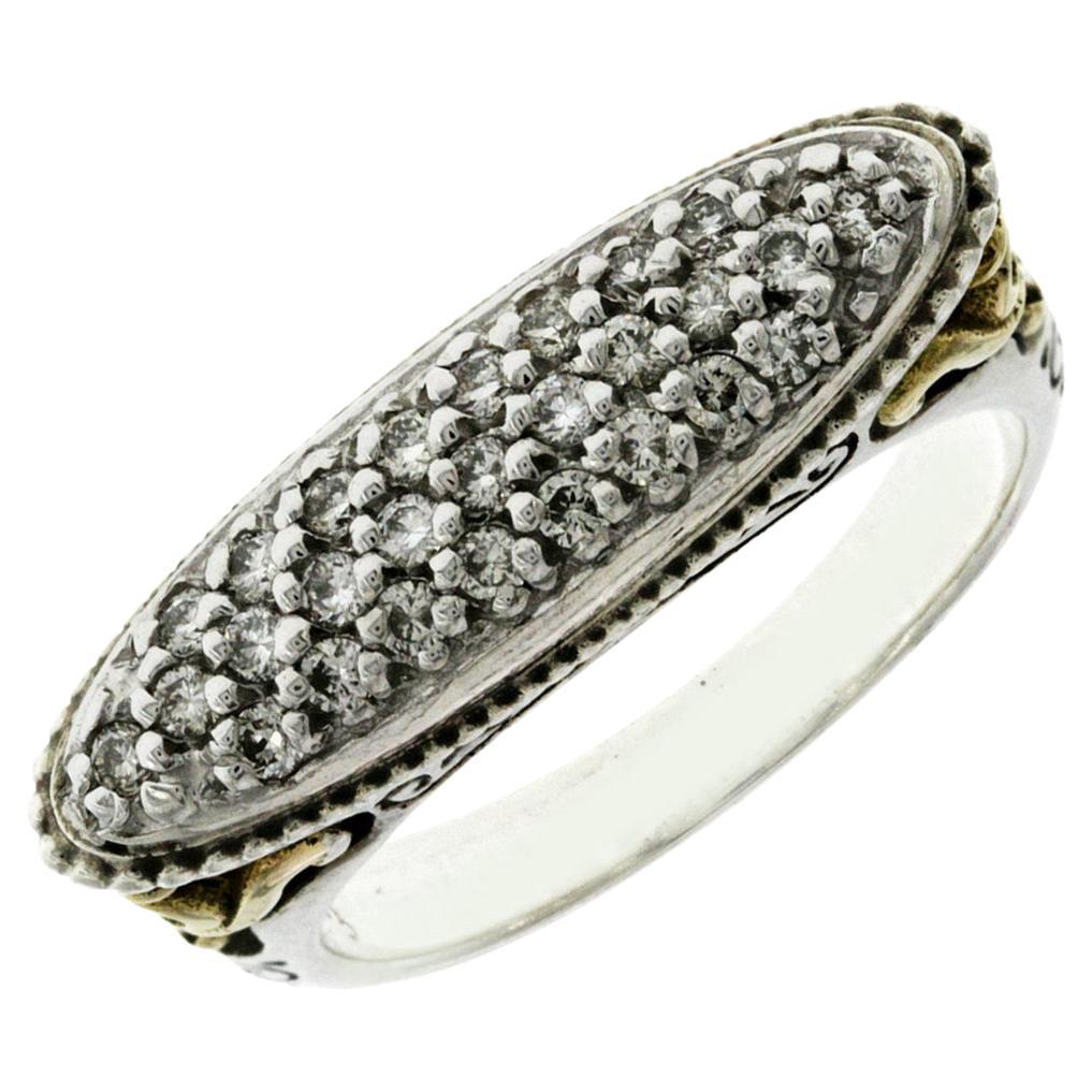 100% Authentic, 100% Customer Satisfaction

Top: 7.4 mm

Band Width: 3 mm

Metal: 925 Sterling Silver And 18K Gold

Size: 7

Hallmarks: KONSTANTINO 925 750

Total Weight: 8.1 Grams

Stone:  0.40 CT Diamonds

Condition: New Without Tag 
