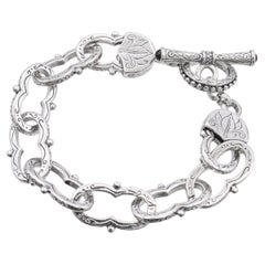 Konstantino Bracciale a maglie incise con chiusura a ginocchiera in argento sterling con granato