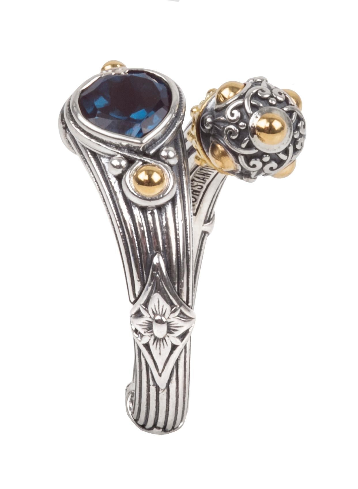 Konstantino Sterling Silver Gold and Blue Topaz Heart Ring.  Accents and Detail in 18K Yellow Gold.  Stamped Konstantino 925 and 750.
