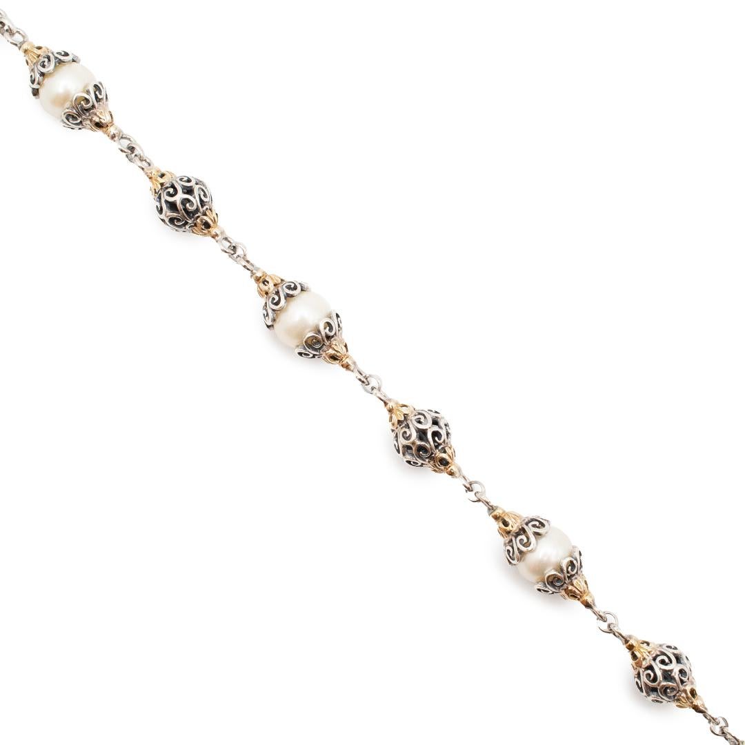 Brand: Konstatino

Gender: Ladies

Metal Type: 925 Sterling Silver & 18K Yellow Gold

Length: 18 inches

Width: 9.85mm

Weight: 49.06 grams

Ladies silver and 18K yellow gold single strand collar bead necklace. Engraved with 