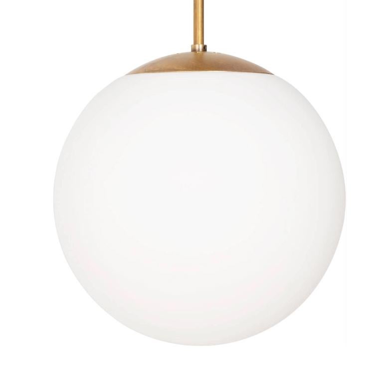 Ceiling lamp model Glob designed by Konsthantverk and manufactured by themselves. 

Incredibly beautiful in all its simplicity. Available in several different varieties and sizes. Raw brass or chrome combined with matte white opal glass. Available