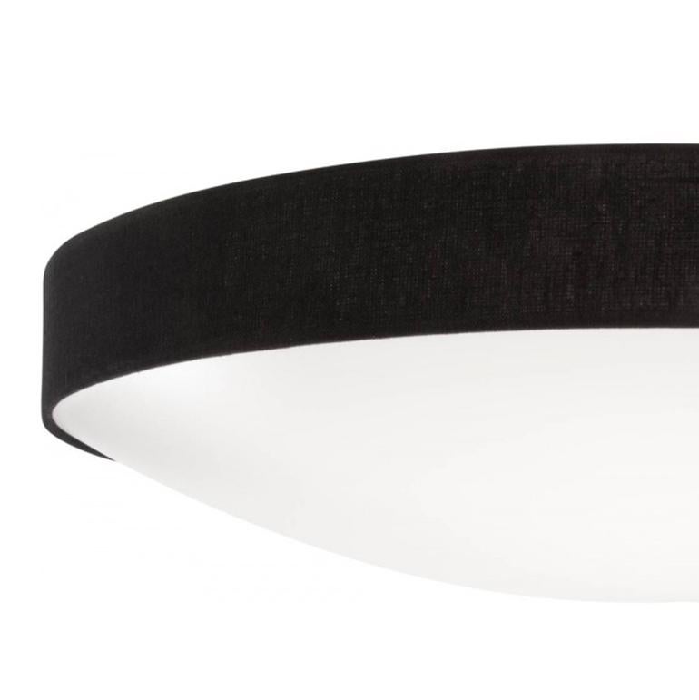 Ceiling lamp model Kant designed by Konsthantverk and manufactured by themselves. 

Kant has a textile exterior ring that produces a slightly softer impression. 
Available in five varieties (different colored fabrics) and two sizes.

The