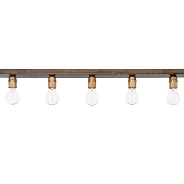 Lamp model Raad ceiling lamp designed by Konsthantverk and manufactured by themselves.

Pure and honest form in raw brass / iron oxide. Good both as mood light and general light. Takes natural space in any room (almost a piece of furniture in