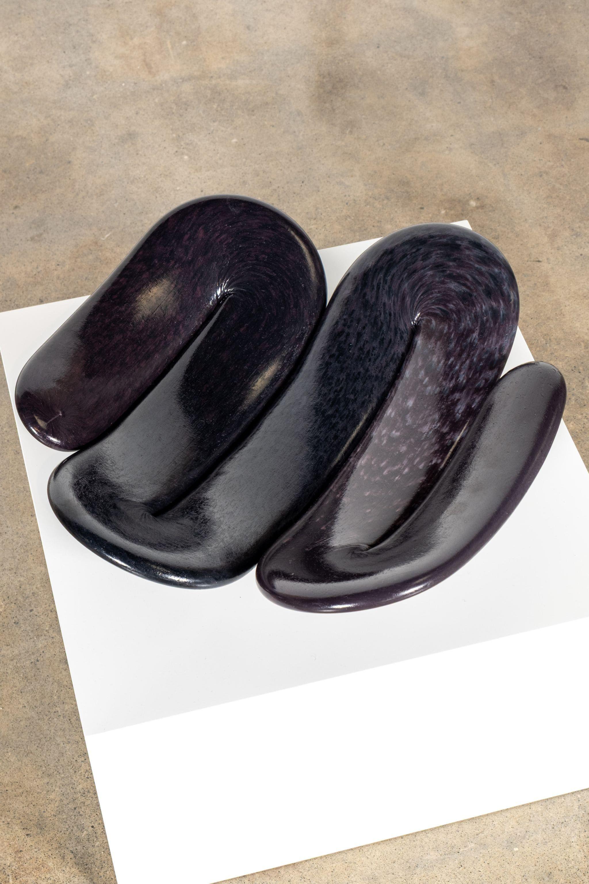 The Wandel bowl is a softly sloping, endearingly wobbly vessel. Extruded slowly from buttery recycled plastic, the bowl’s meandering lines melt together to form a shallow basin. Colour ebbs and evolves though the wide printed line. Suitable for use