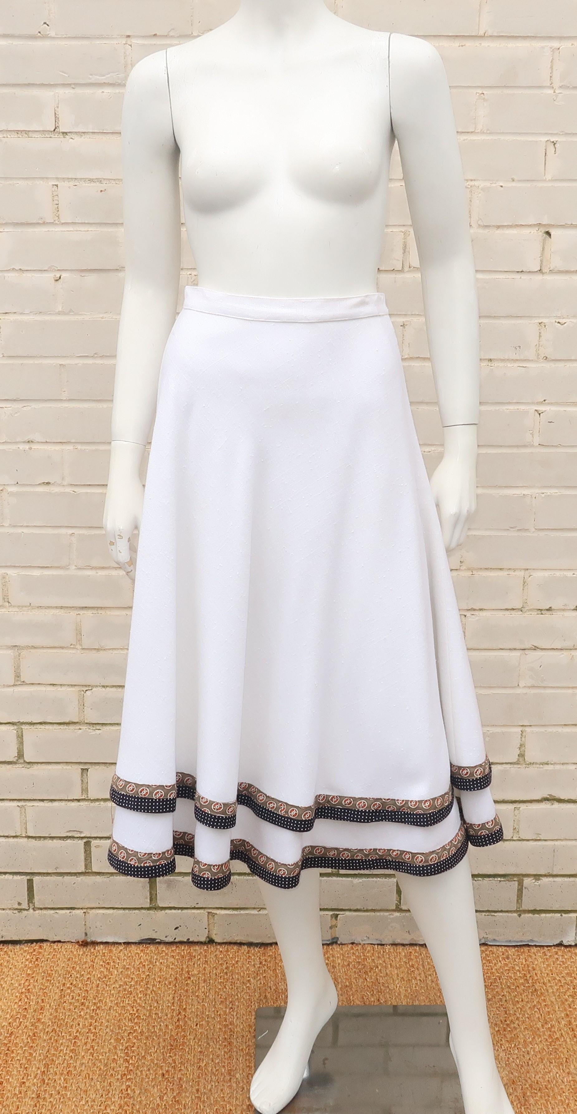 Dutch designer, Koos Van den Akker, became known in the 1970’s for his ‘collage’ clothing designs ... expertly mixing textiles for a great bohemian effect.  This two tiered skirt has a peasant style silhouette with a double layer of a heavy white