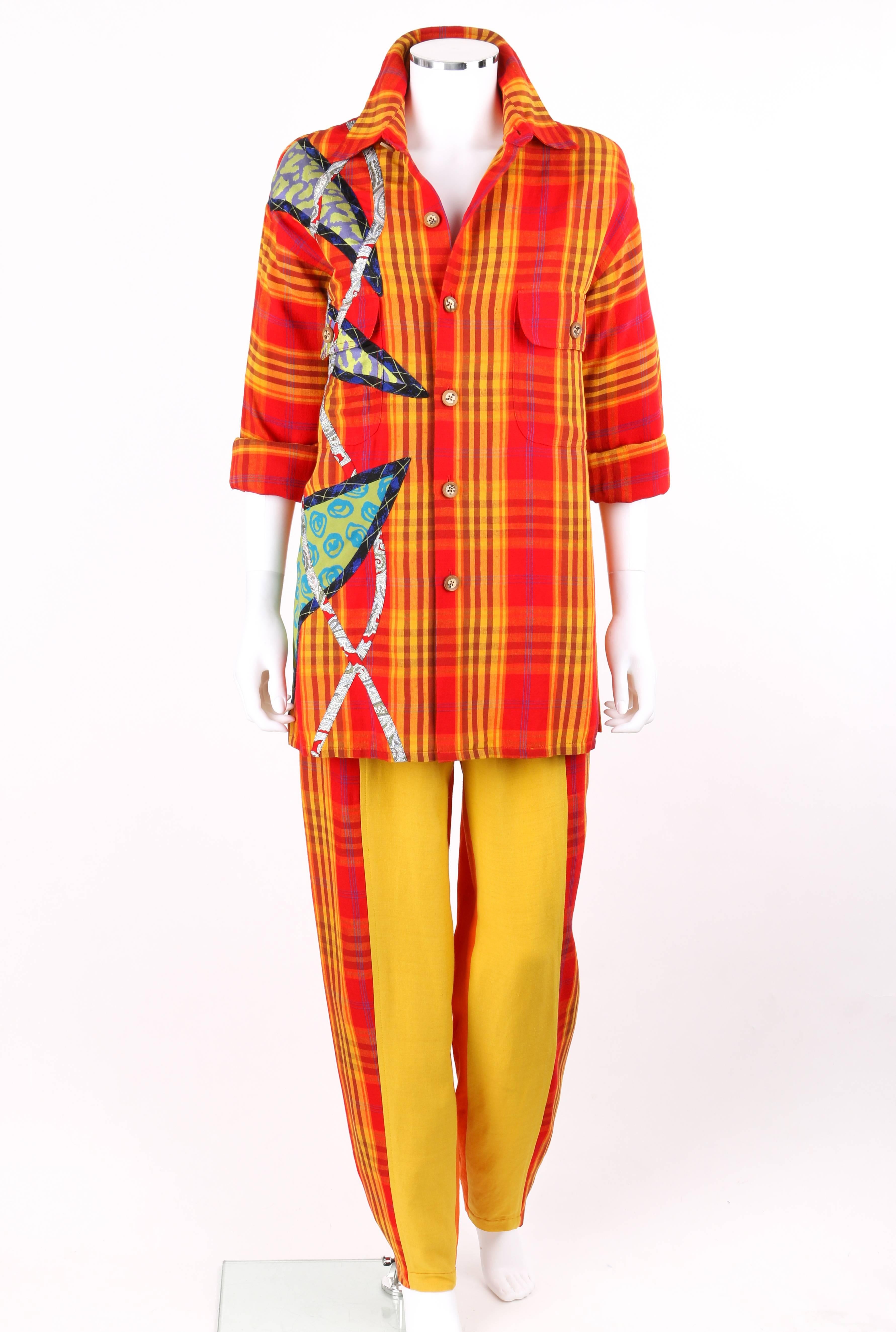 Vintage Koos Van Den Akker c.1980's two piece plaid patchwork button up shirt pants suit set. Red, yellow, orange, and blue plaid shirt. Six center front wooden button closures. Long sleeves with two button closures and two knife pleats at cuff.