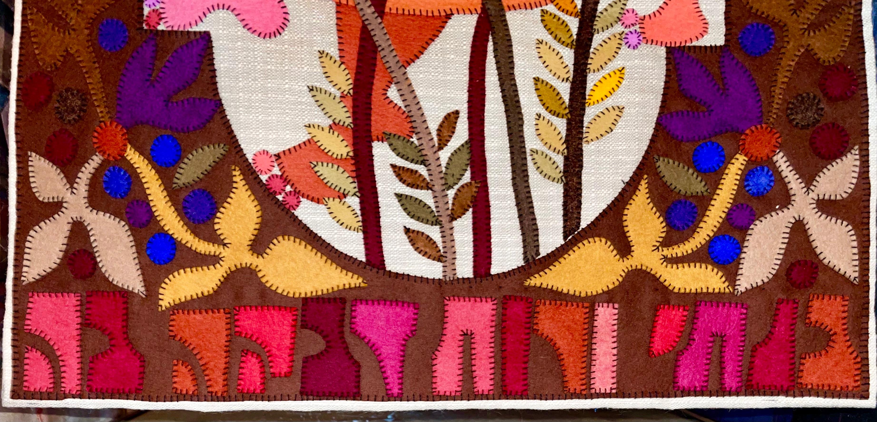 This tapestry wall hanging depicts two women embracing, Ruth and Naomi, the ancestor of King David, all made by hand. Woven and stitched. With a bible verse in hebrew.

Kopel Gurwin (Hebrew: קו�פל גורבין‎) (1923–1990) was an Israeli Bezalel School