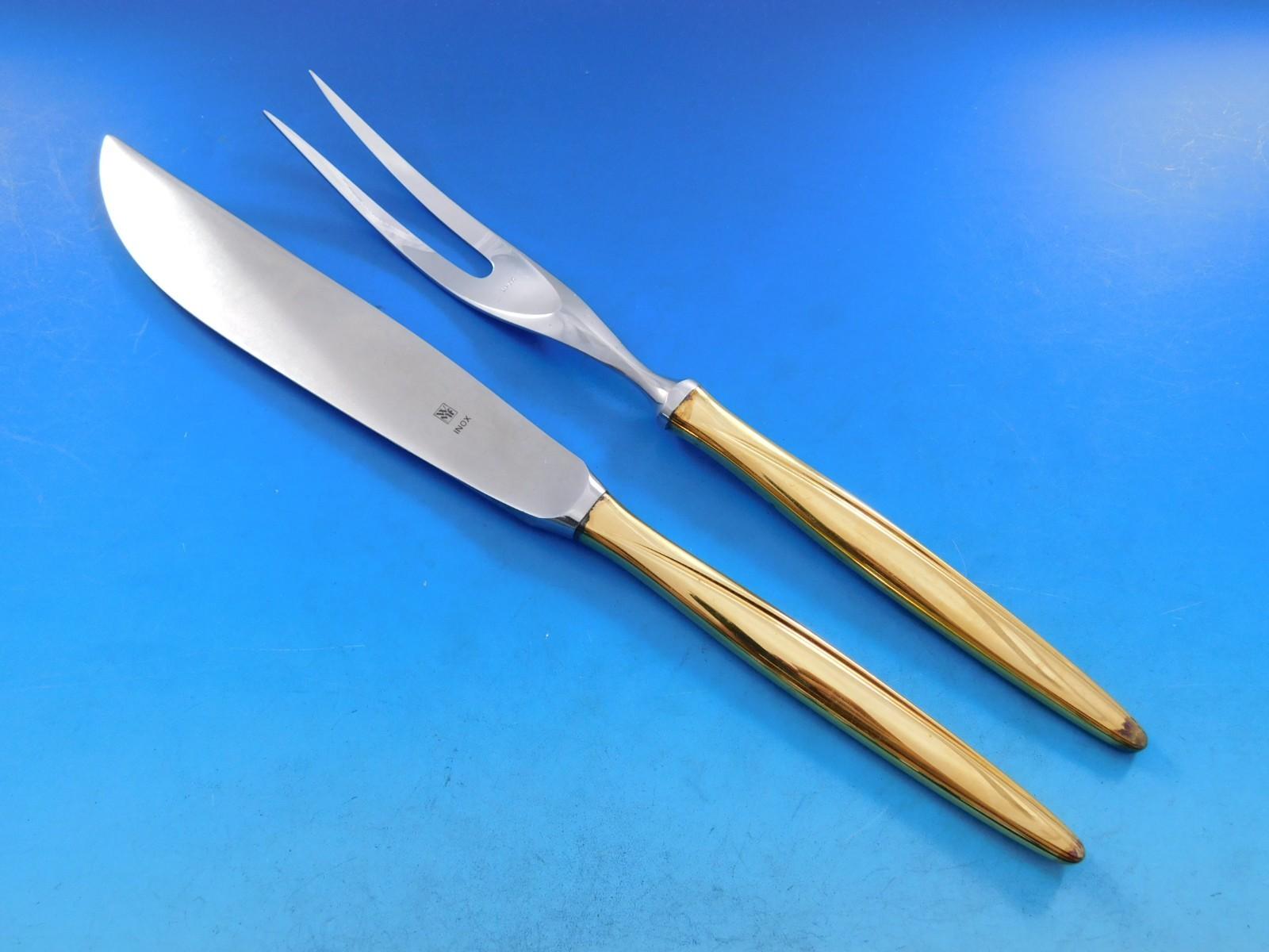 Copenhagen Vermeil (komplett vergoldet) von WMF 800 Neusilber-Besteck - 65 Teile. Dieses Set enthält:
12 Tafelmesser, 8 3/4