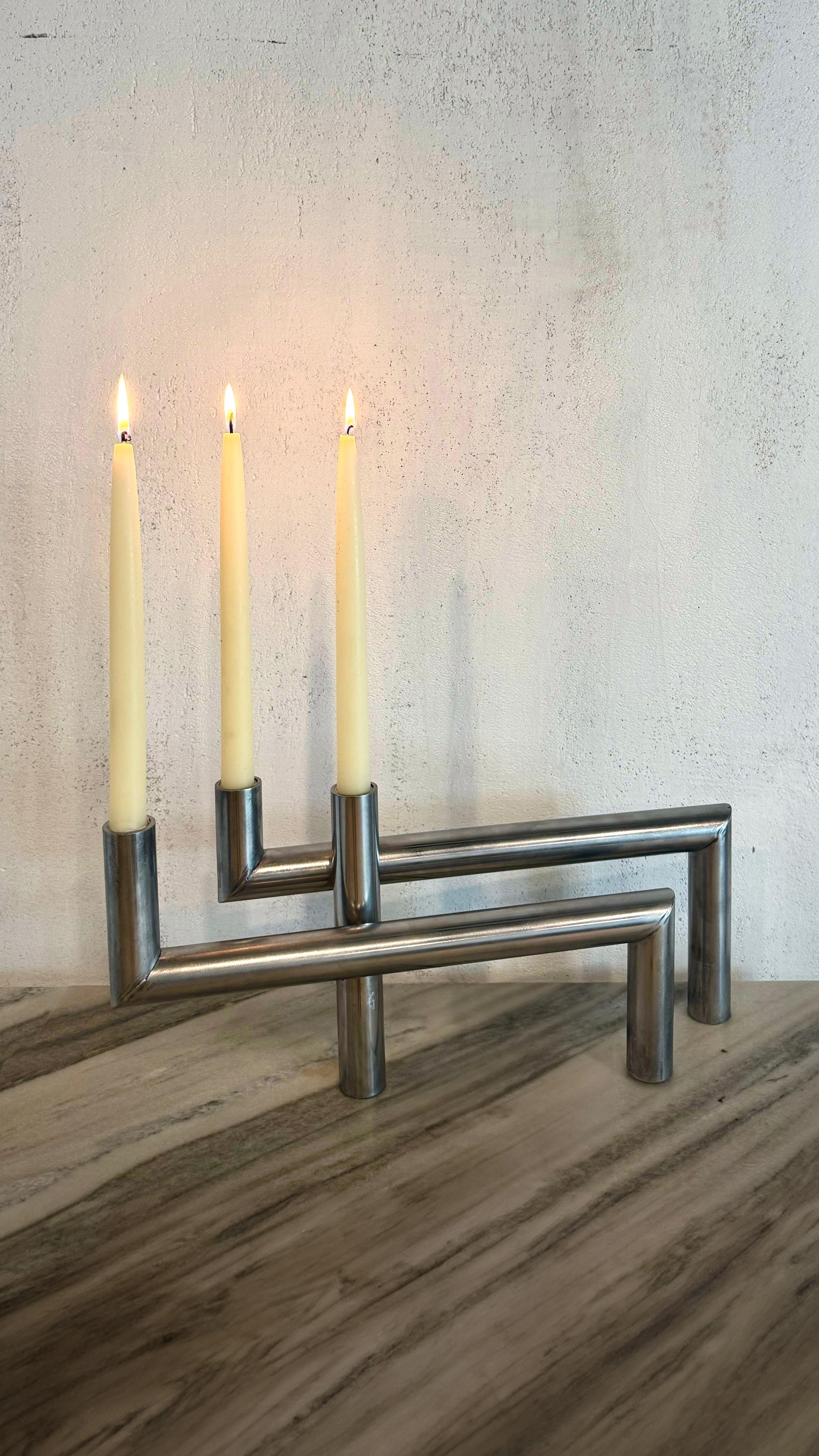 Named for Alfred Kopka, the first craft master at the Bauhaus school's metal shop, expertly crafted by hand in Brooklyn, NY, the Kopka Candelabra is a sculptural addition to any space. Made of steel, its quality and design make it a standout piece.