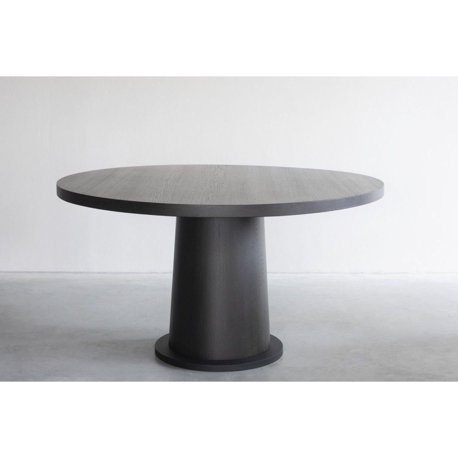 Kops dining table round one by Van Rossum
Dimensions: D147 x W147 x H75 cm
Materials: Oak, Steel.

The wood is available in all standard Van Rossum colors, or in a matching finish to customer’s own sample.
The steel is available in four colors
