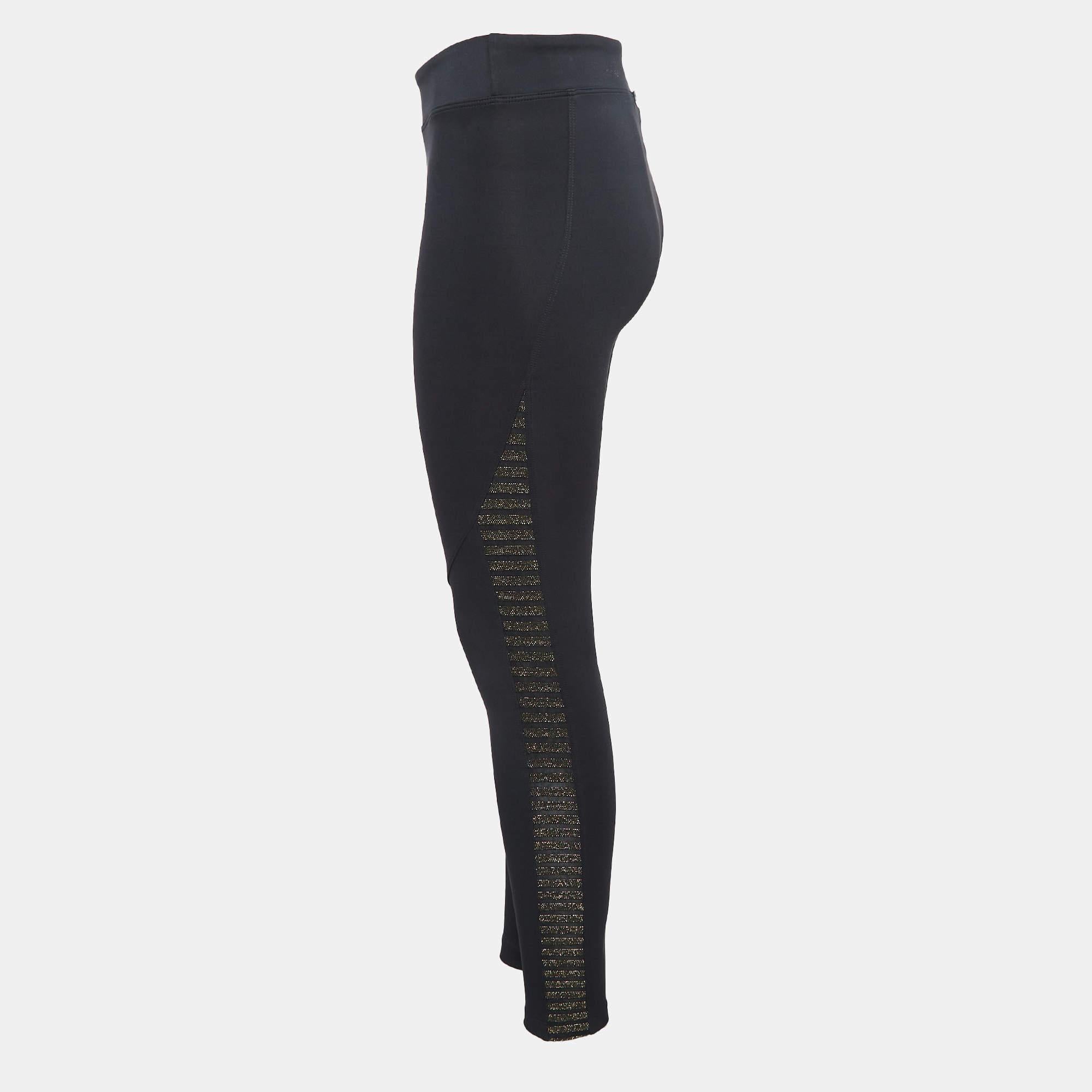 Eleva il tuo stile con i leggings di Koral. Realizzato in un elegante  jersey elasticizzato  questi leggings sono caratterizzati da un tocco glamour grazie ai dettagli in rete lurex. Il mix di comfort e scintillio li rende perfetti per i look casual