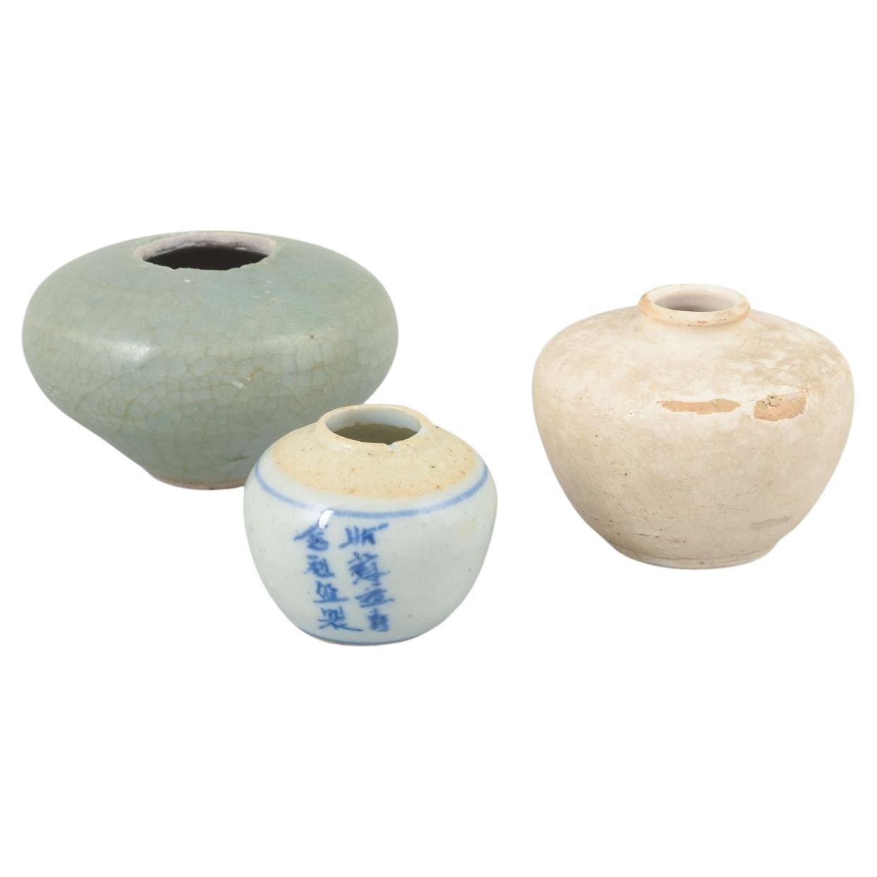 Korea. Set of three small ceramic vases in simple forms, 19th/20th C.