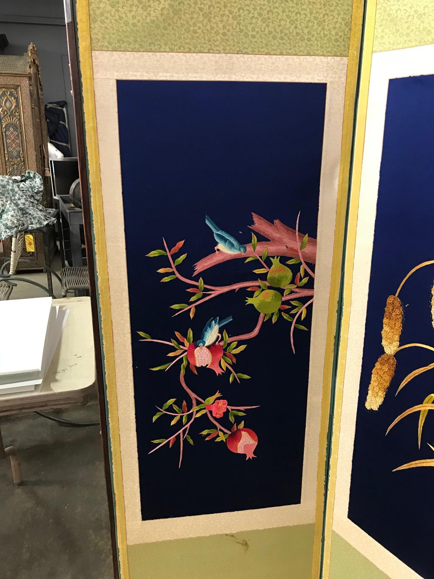 A gorgeous early to midcentury Korean embroidered eight-panel screen depicting scenic nature motifs of flowering trees, playful birds, and floating butterflies. Rare and hard to come by. The embroidery work and colors are quite stunning. 

We