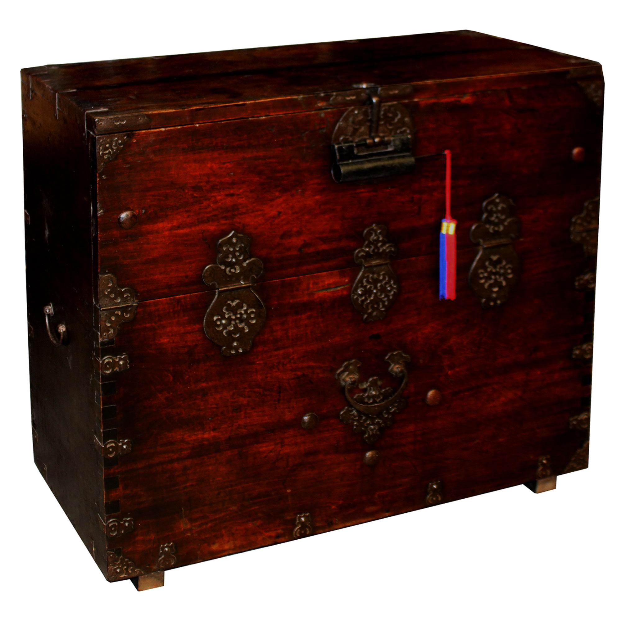 Korean Bandaji (blanket chest). Every Korean household had a bandaji to store blankets for sleeping. Made of pine wood with original iron hardware depicting treasure vases for good fortune.
Handsome chest can be used in an entry or as a bedside