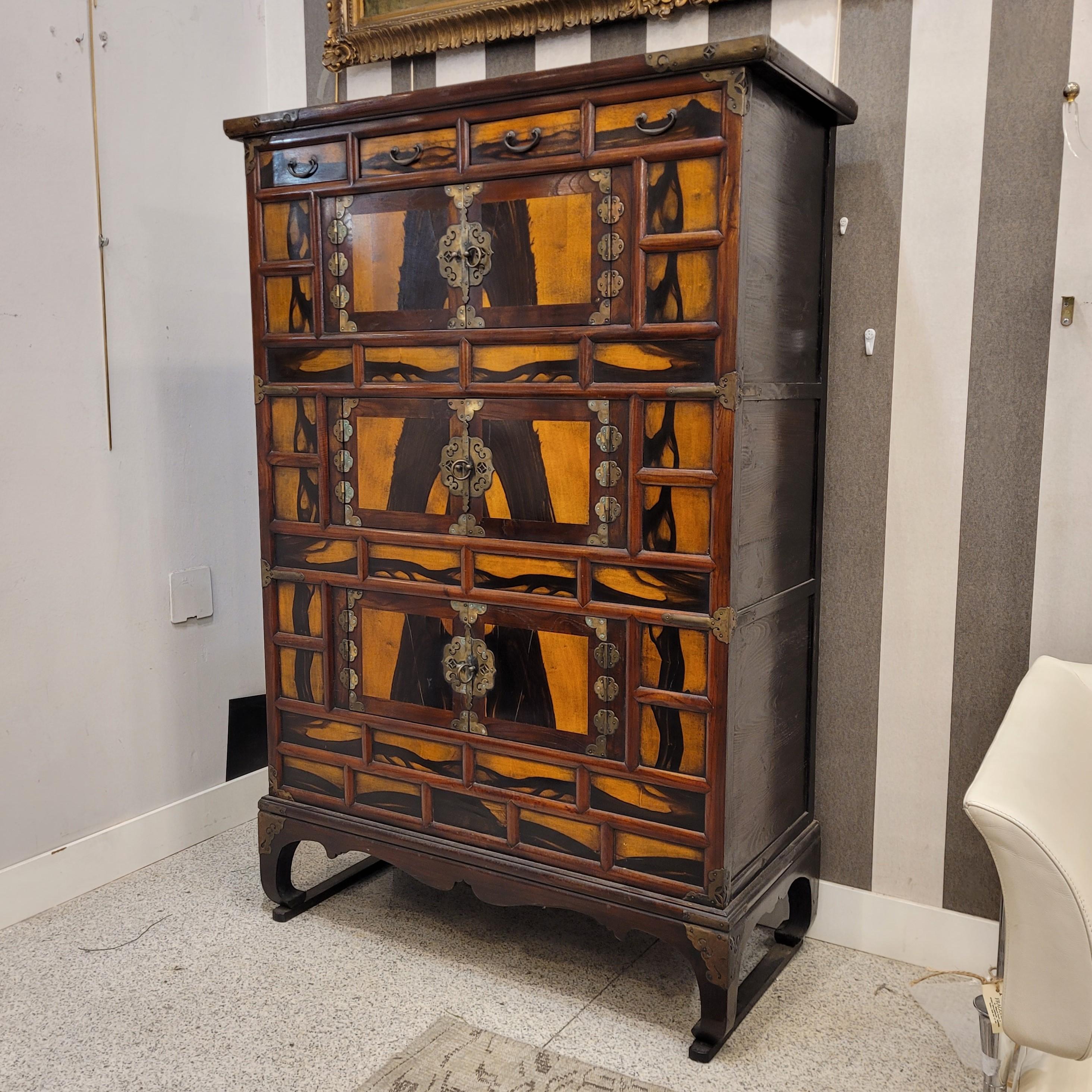 One of a Kind  three-tier Korean wardrobe or chest known as samcheungjang, made in the 19th century during the Choson period (1392 - 1910) in South Korea. The most common are two-level chests, such as the one in the Korean Folk Museum, while