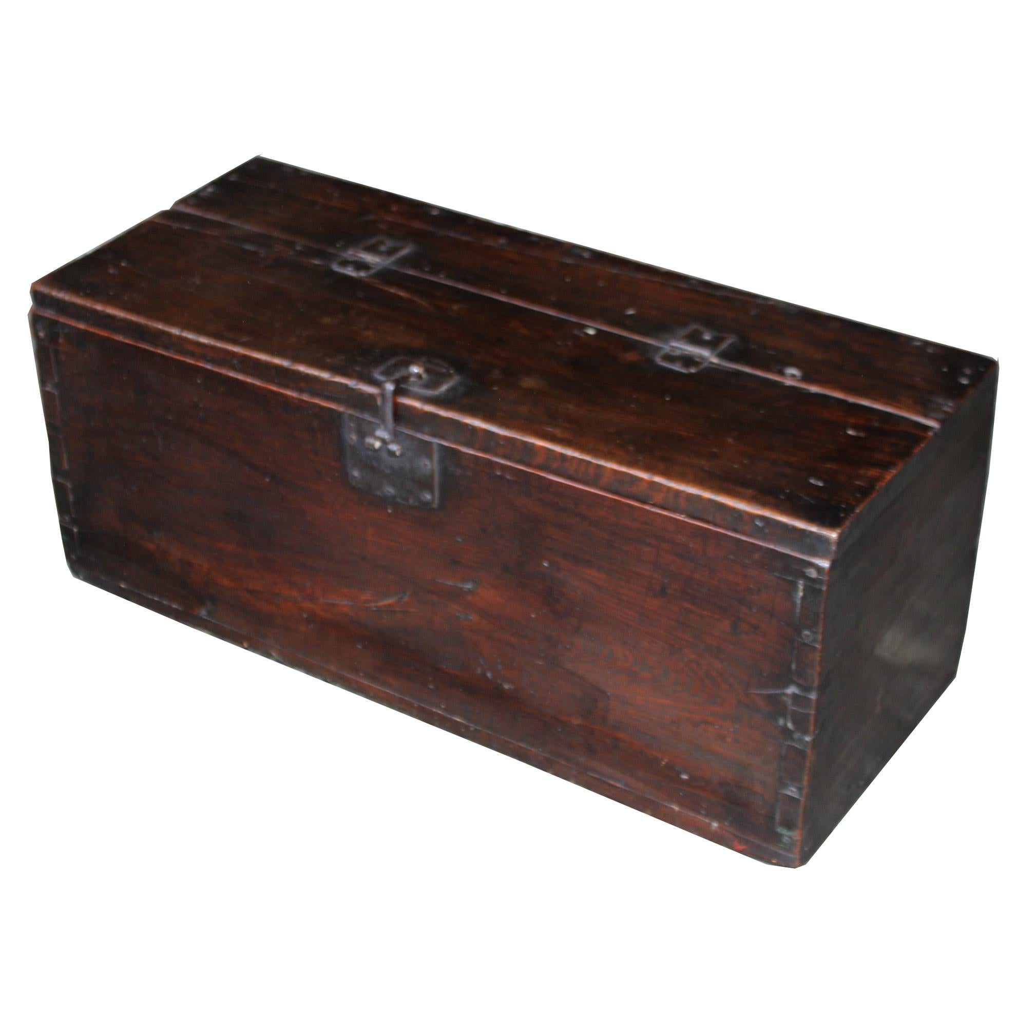 Antique Korean coin chest. Made from Korean pinewood and used to store coin. Use as a low coffee table.