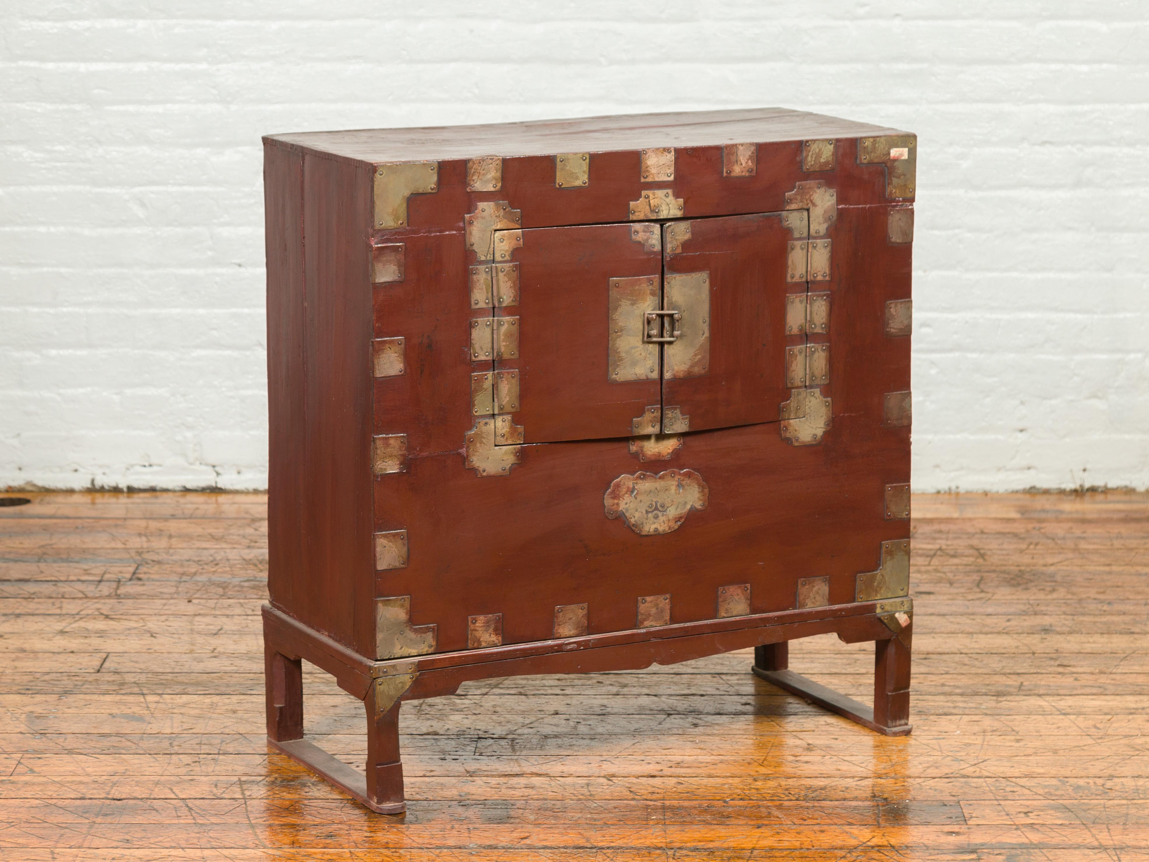 Carved Korean Side Chest on Legs with Traditional Brass Hardware and and Petite Doors For Sale