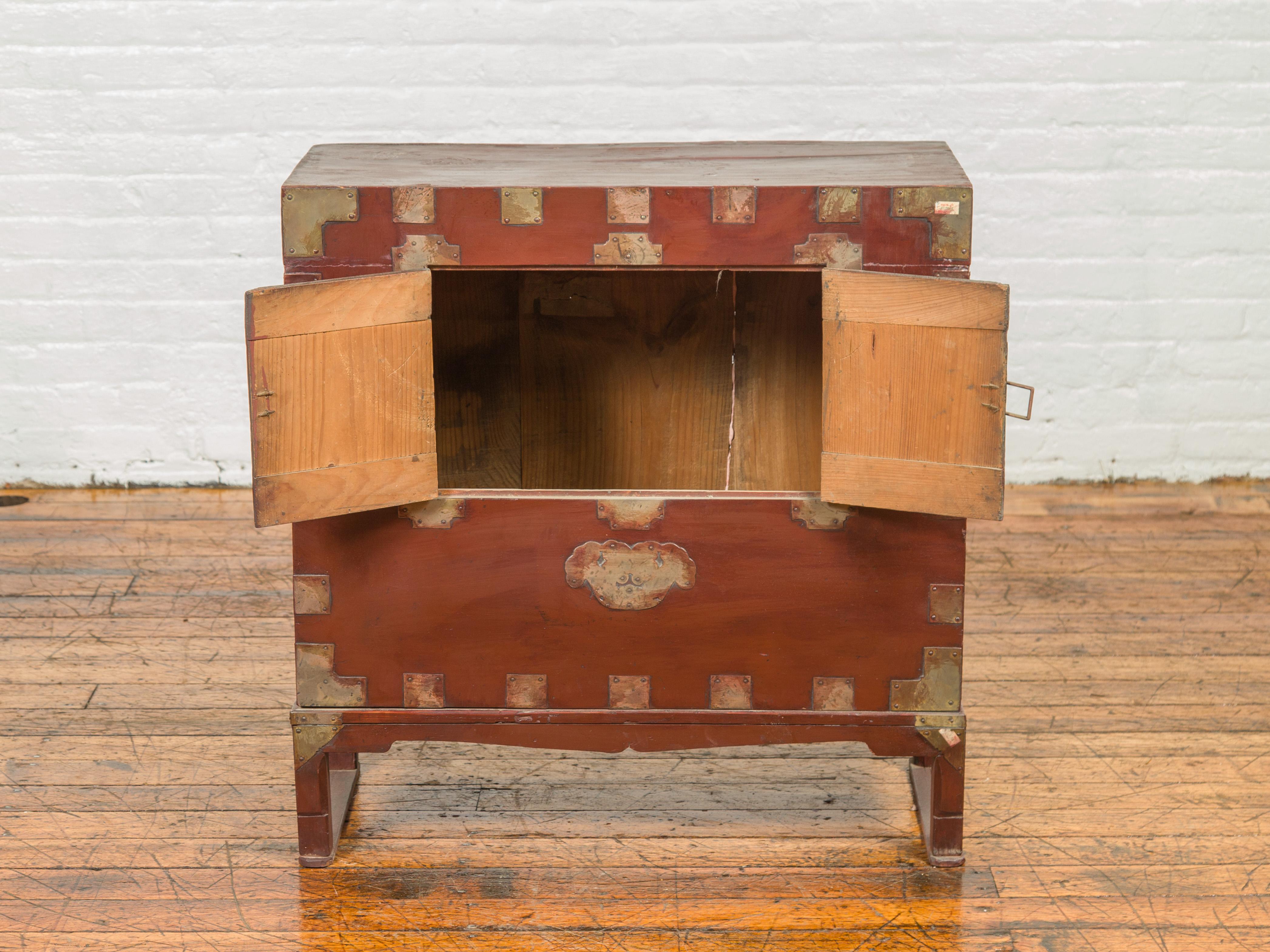 20th Century Korean Side Chest on Legs with Traditional Brass Hardware and and Petite Doors For Sale