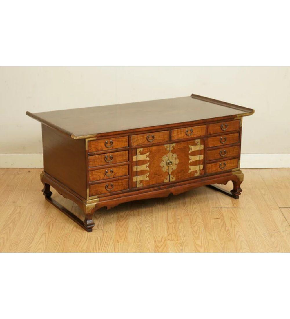 Antiques of London are delighted to offer for sale this beautiful late 19th-century Korean elm coffee table with lots of drawers.

This is a very well-made and solid piece of furniture with beautiful patina all around.

In total, there are 20