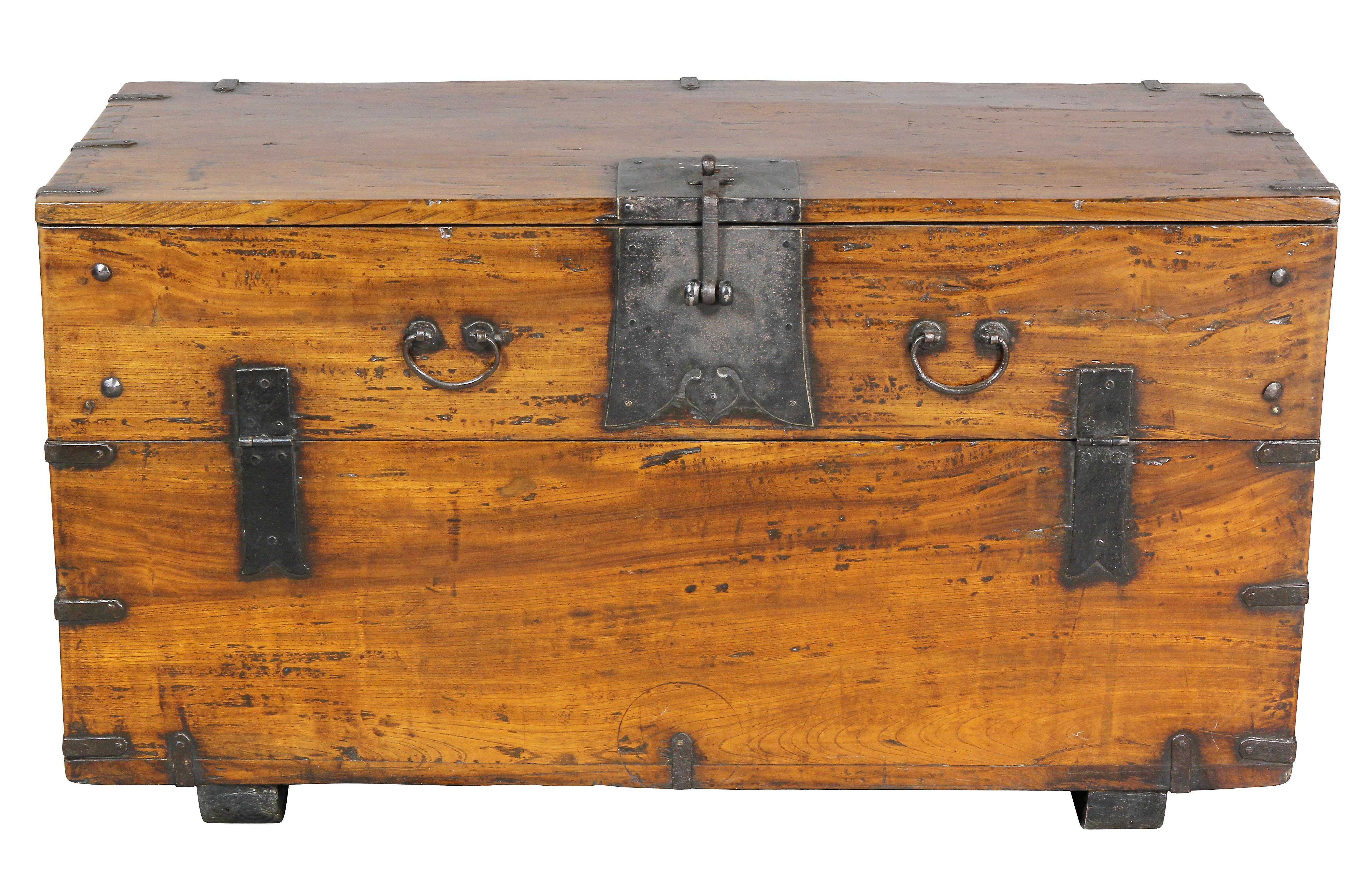 Rectangular top with oxidized wrought iron hardware, the conforming body of the piece with a hinged flap down door revealing a open compartment.