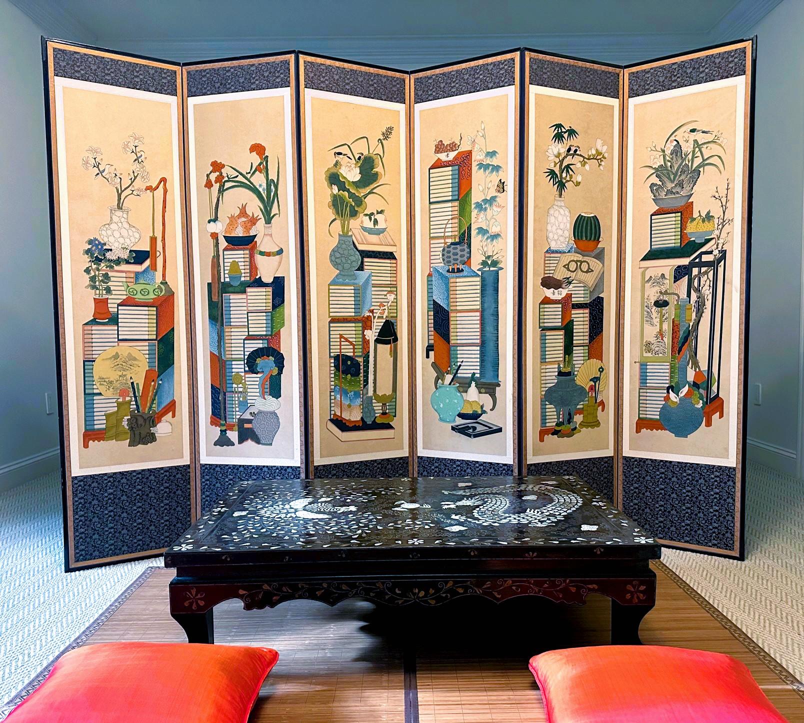 A six-panel painted folding floor screen from Korea circa early 20th century. This type of screen is called Chaekgeori (books and things) which is quite unique to Korea. It became popular at the end of 18th century favored and encouraged by King
