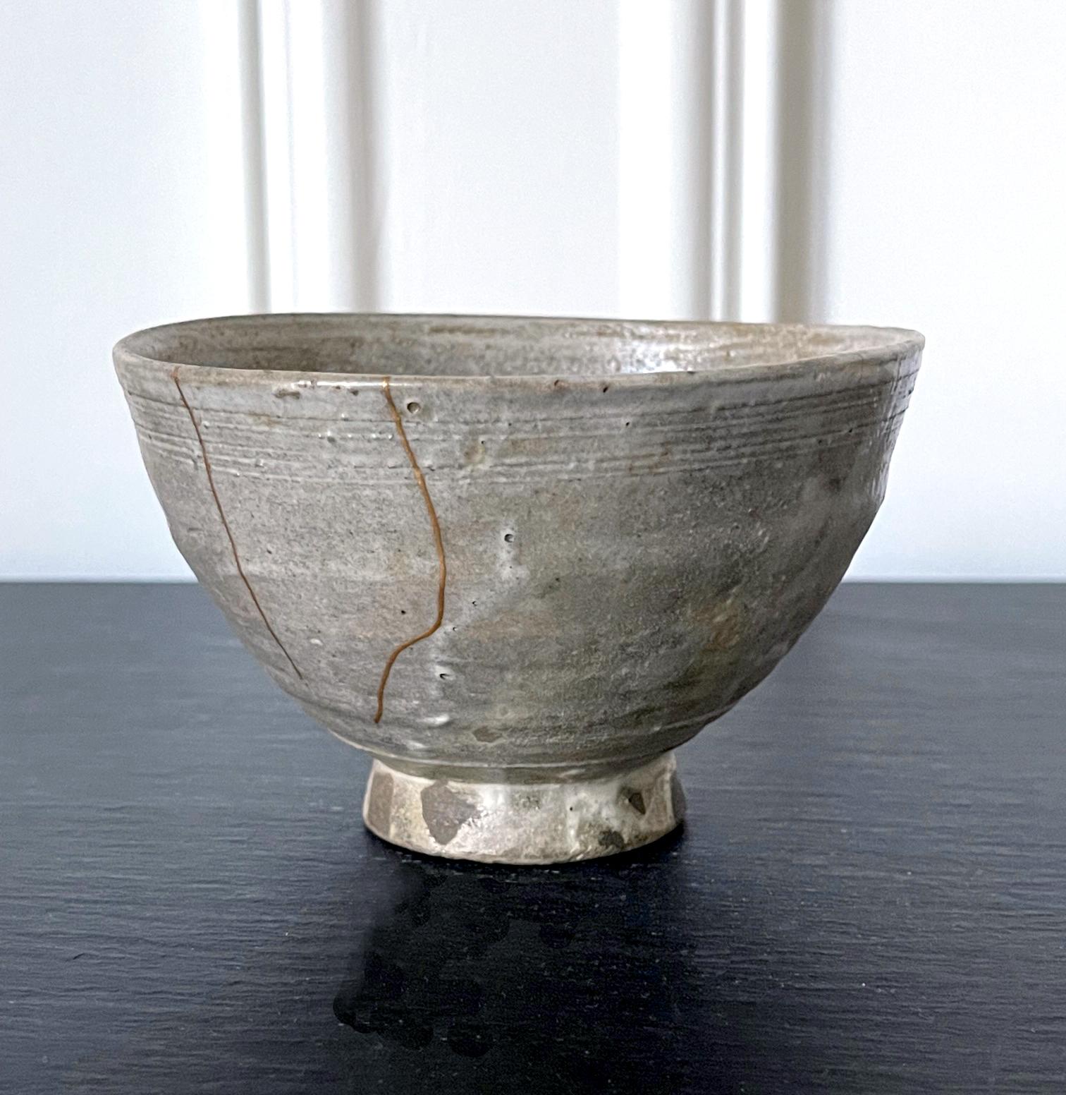 A ceramic chawan (tea bowl) circa 17-18th century fired in the Busan kiln in Korean specifically for the Japanese market. The kilns were run by the So clan that ruled Tsushima Island to fill the order from Japan with detailed preference. Gohon