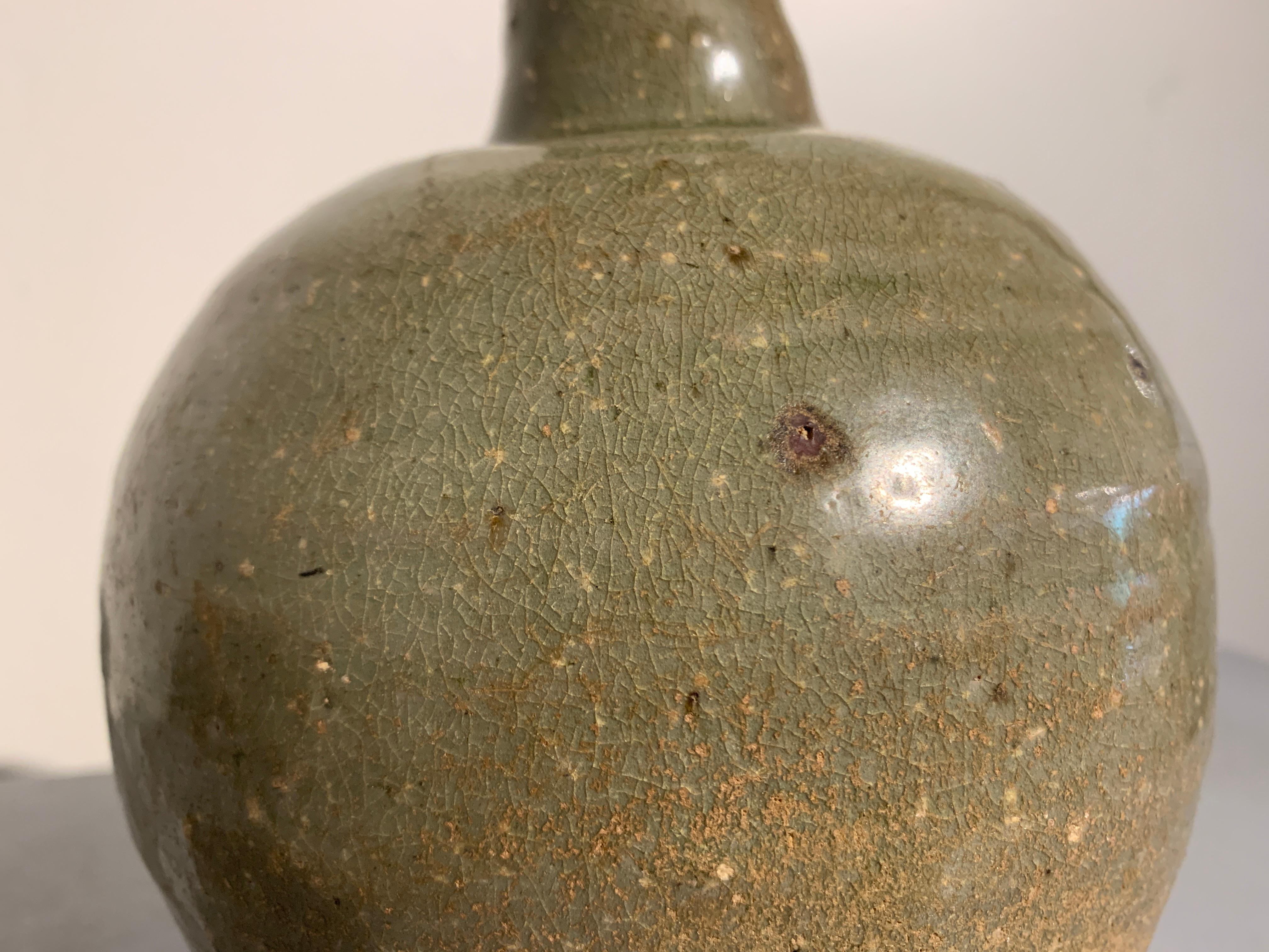 Korean Goryeo Celadon Glazed Bottle Vase with Kintsugi Repair, 12th Century In Good Condition For Sale In Austin, TX