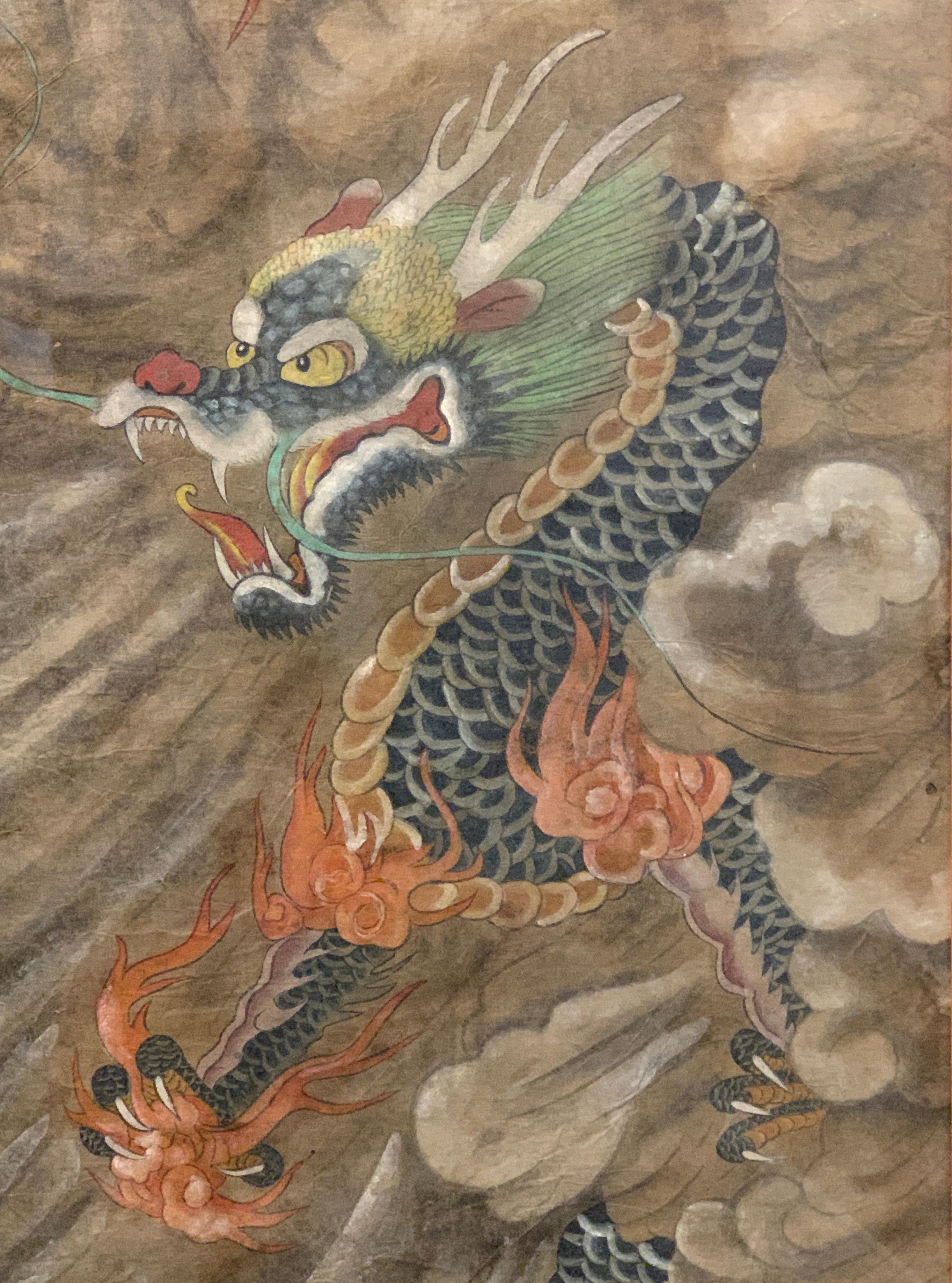 A powerful Korean folk painting (minhwa) of a dragon, ink and color on handmade mulberry paper, framed and glazed, Joseon Dynasty, late 19th century, Korea.

The dynamic folk painting, called minhwa in Korean, features an vigorous dragon emerging