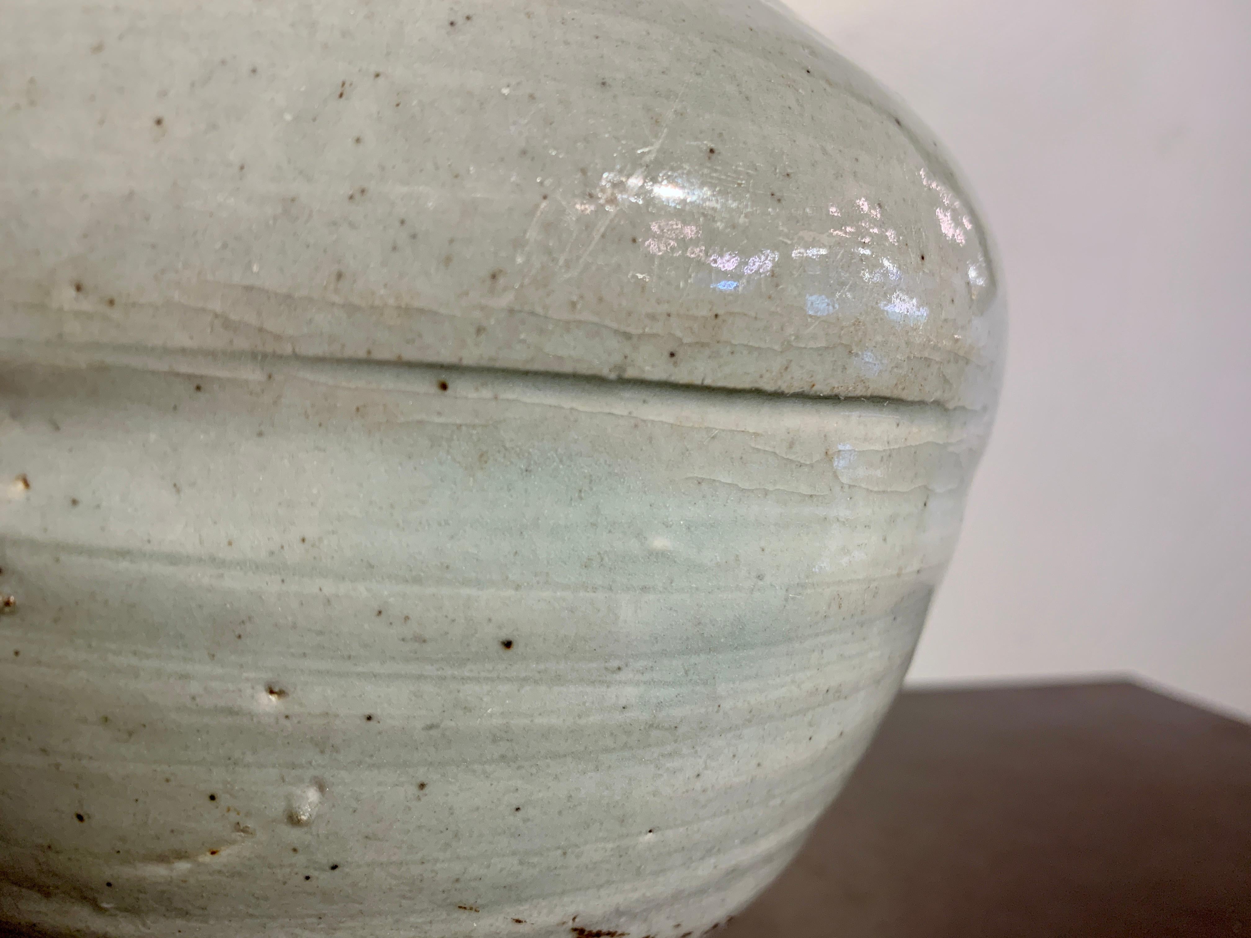 white porcelain moon jar