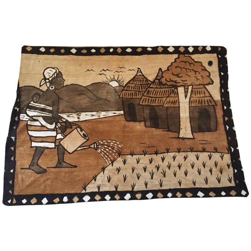 Vintage Korhogo handspun, handwoven and hand-painted cotton mud cloth by the women of the Korhoga Village who spin the cotton, while the men weave and sew the cloth into a large canvas. 
The women make fermented dye which is painted onto the story