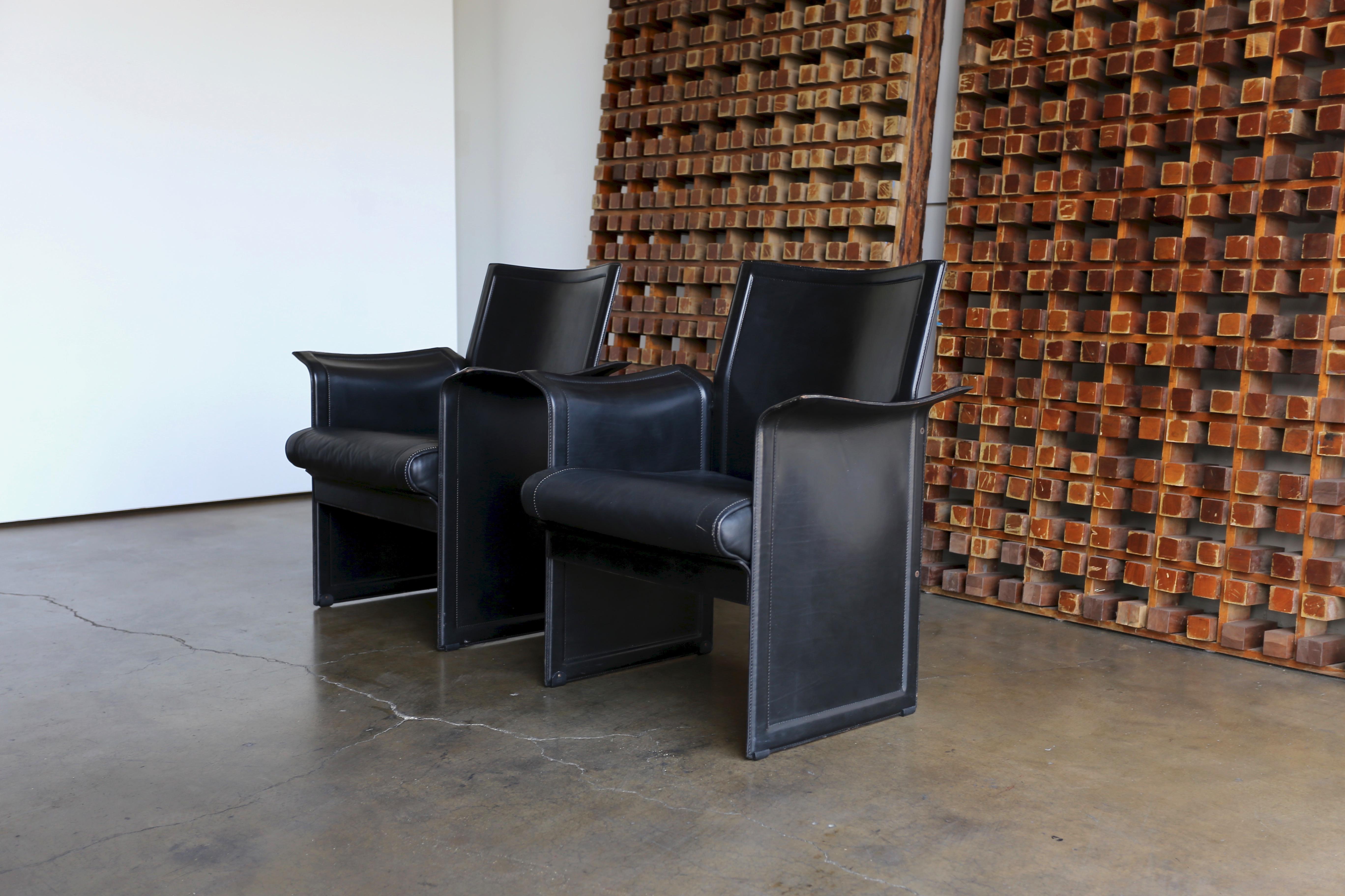Pair of Korium leather chairs by Tito Agnoli for Matteo Grassi in original condition.