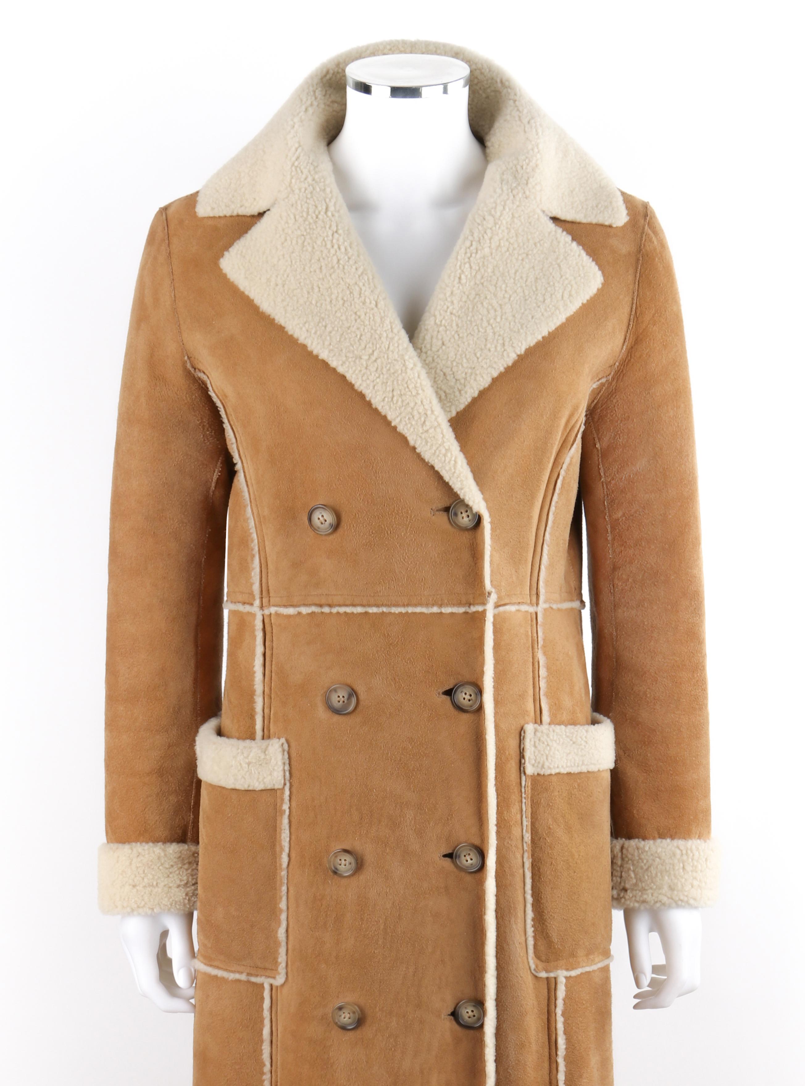 Vintage: KORS by MICHAEL KORS Tan Suede Shearling Fur Double Breasted Long Overcoat

Brand / Manufacturer: Michael Kors
Collection: Kors by Michael Kors
Designer: Michael Kors
Style: Full-length overcoat
Color(s): Shades of tan and off white 
Lined: