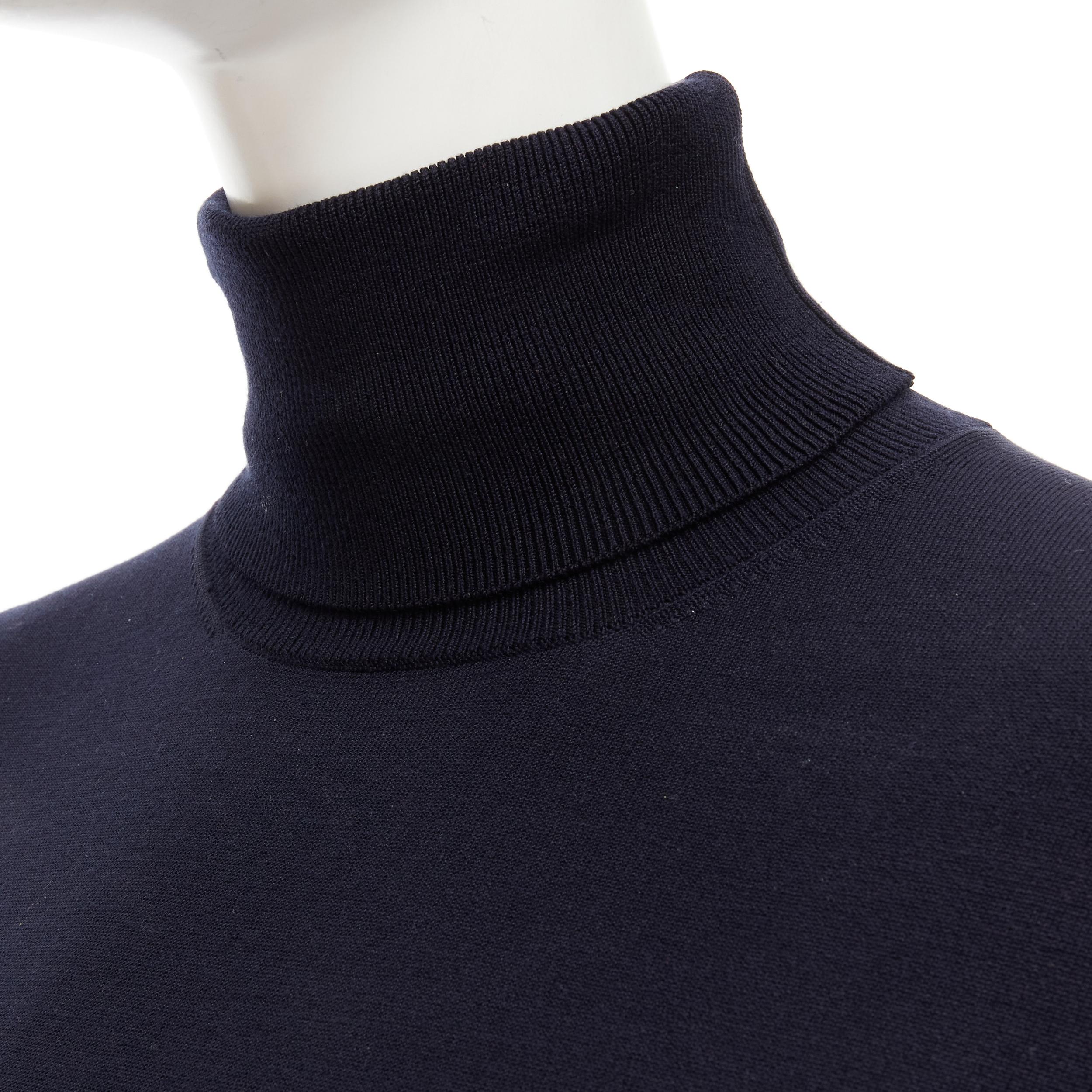 KORS MICHAEL KORS navy blue silk nylon knit long sleeve turtleneck sweater S 
Reference: LNKO/A01863 
Brand: Michael Kors 
Collection: KORS by Michael Kors 
Material: Silk 
Color: Navy 
Pattern: Solid 
Extra Detail: Tonal stitching detail at