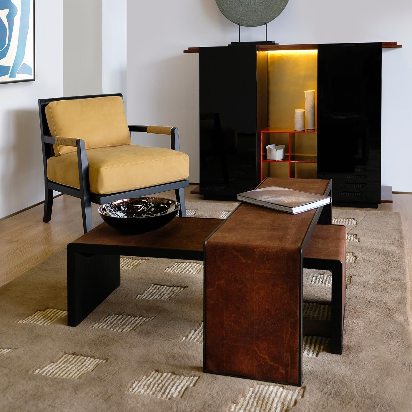 Available in 10 different colors, this cabinet has an eye-catching design defined by an engaging play between open and closed spaces. The warm Canaletto walnut top and base meet the cold finish of the glossy black polyurethane lateral units,