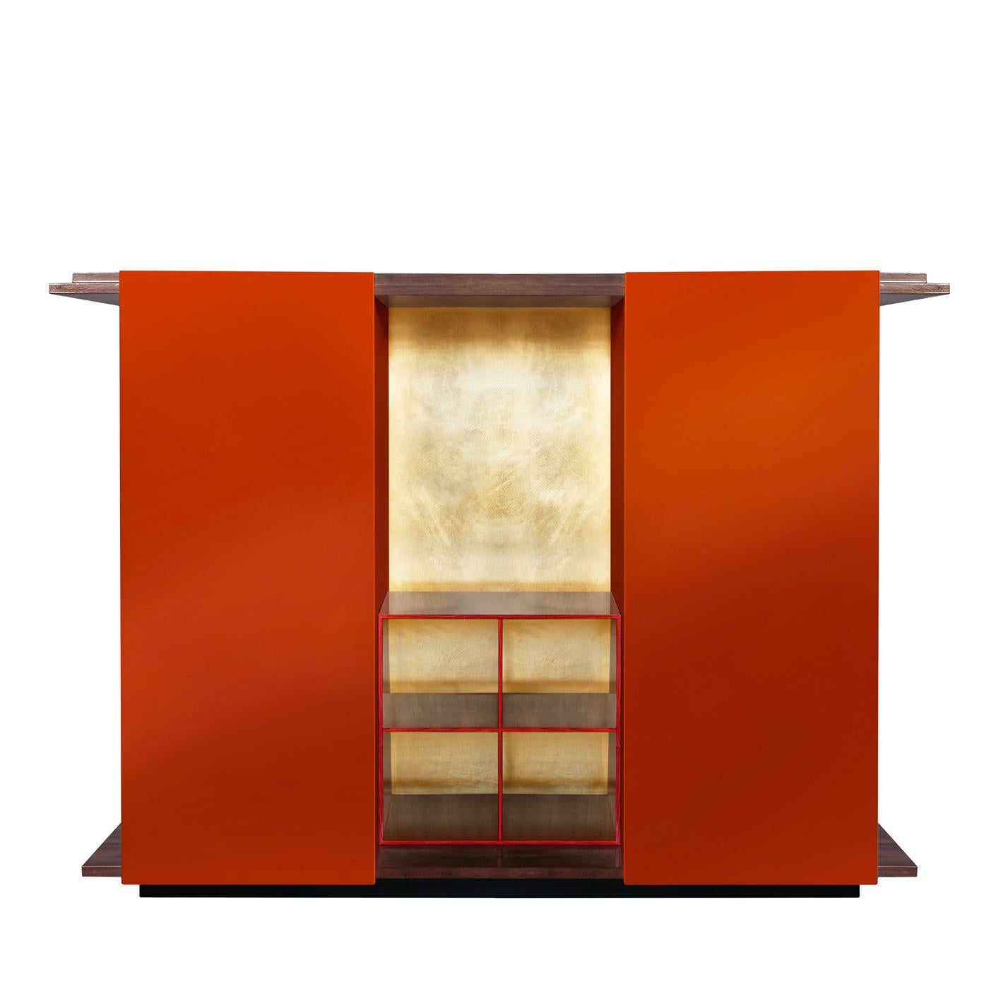 An eclectic piece of luxurious sophistication, this cabinet will make a statement in any interior. Bold and elegant, it features a Canaletto walnut structure that comprises an elongated top and base enclosing two tall doors and five open shelves in