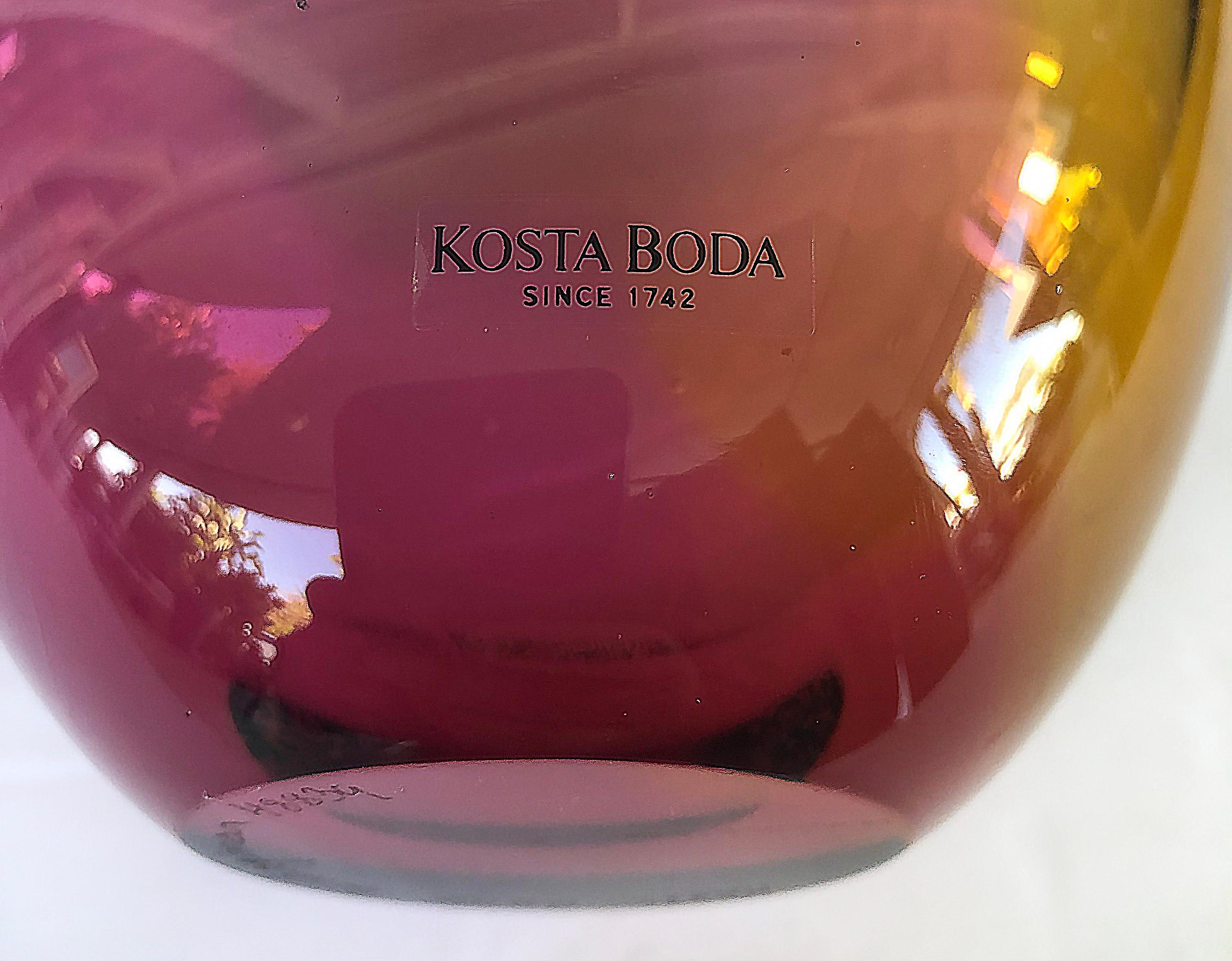 Kosta Boda art glass Fidji bottle vase by Kjell Engman

Offered for sale is a medium-size Kosta Boda art glass Fidji bottle vase by Kjell Engman. The blown glass vase is signed and numbered on the base and the vase retains the original label.