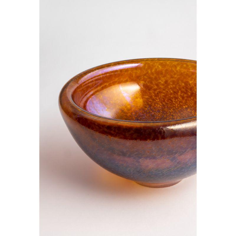 The innovative glass artist Bertil Vallien has created an extraordinary object based on the expression of his original Beans collection – Beans Bowl. To create the bowl-like shape, the glassblower blows the glass outwards and then draws it in while
