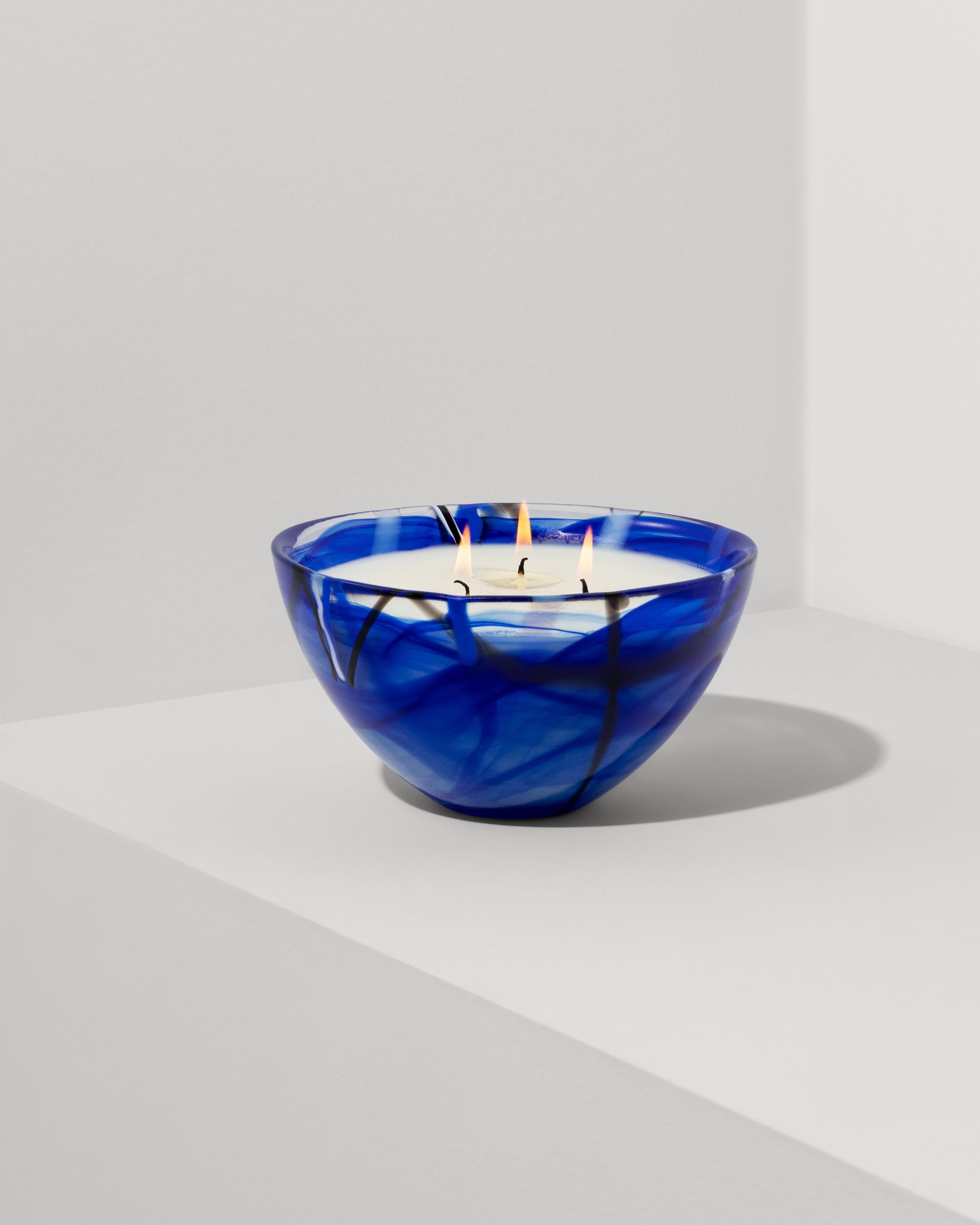 The Contrast candle in Coastal Bloom has notes of Sheer Lemon, Aromatic Rosemary, Red Currant, Fresh Jasmine, Raw Honey Nectar, Sea Salt Accord, Green Leafy Stems, Earthy Geranium, and White Amber.

The candle vessel is a blue Contrast bowl from
